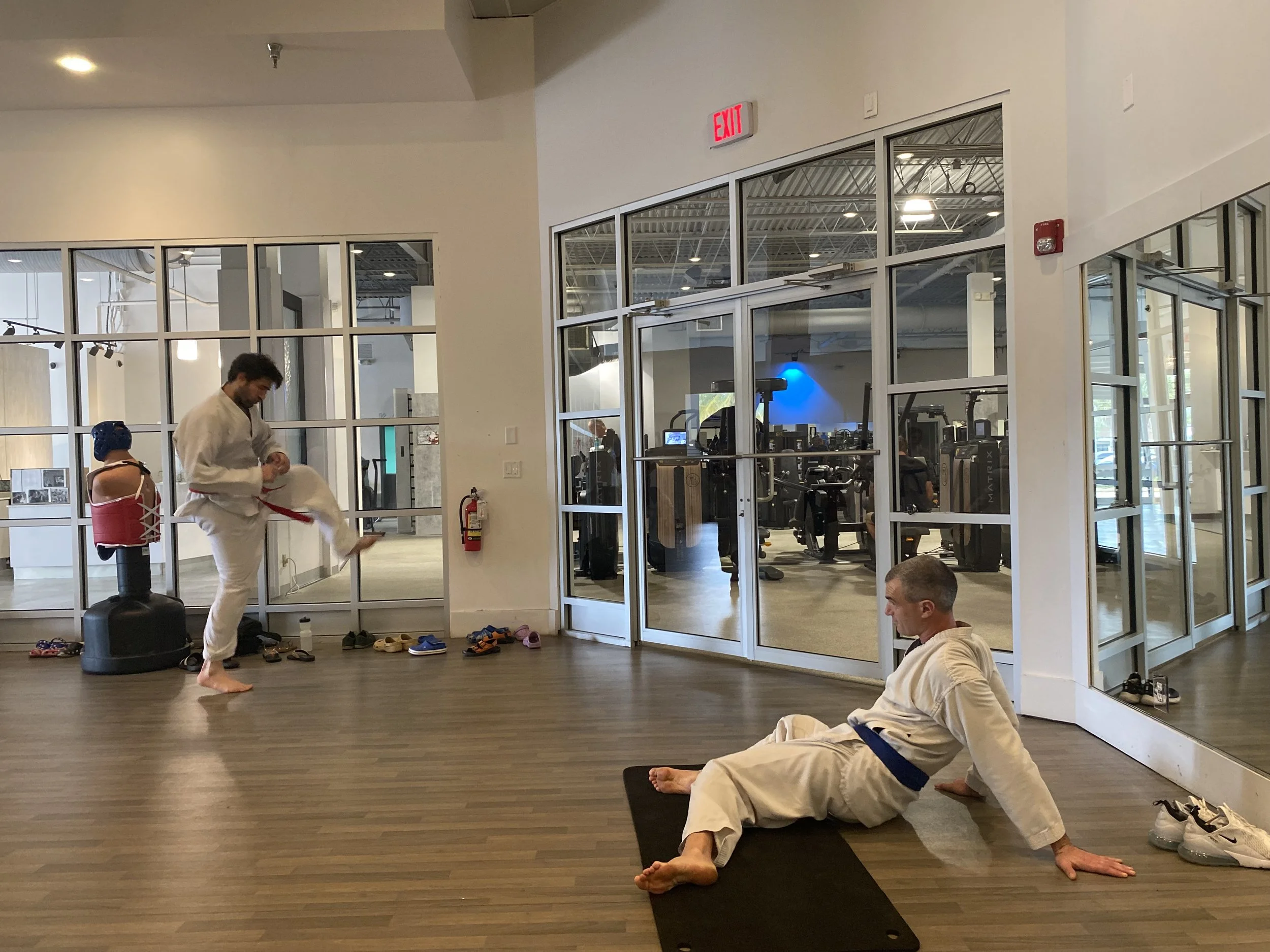 Gil stretches before class