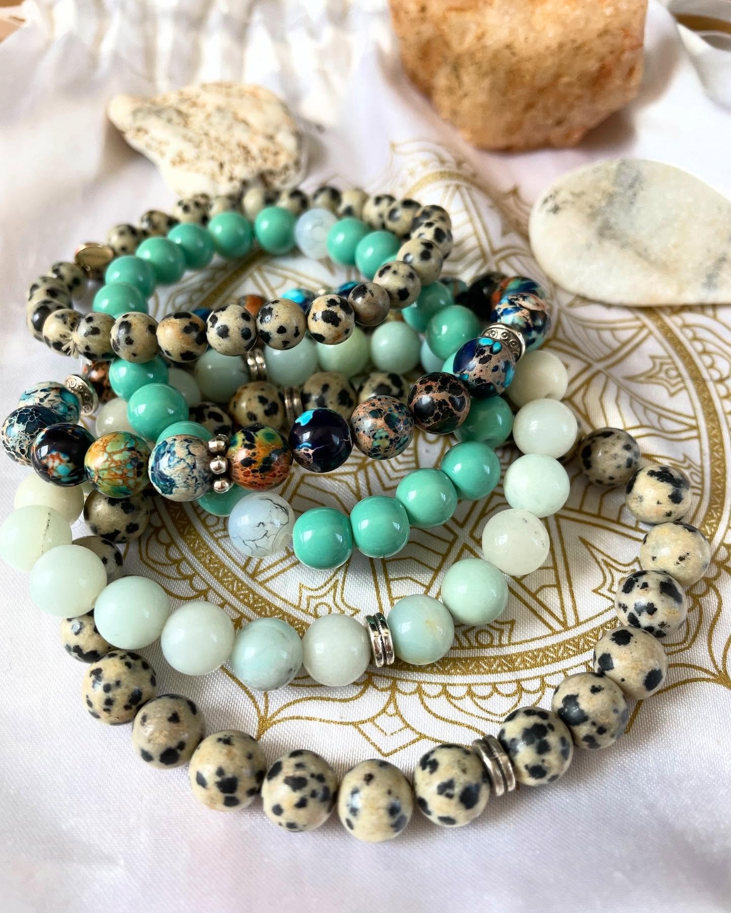 I&rsquo;m loving my newest creations featuring Amazonite, Dalmatian Jasper, and Cosmic Jasper! 

Each stone carries such powerful, unique energy:

🩵 Amazonite &mdash; Known as the Stone of Courage and Truth, it soothes the spirit, calms the soul, an