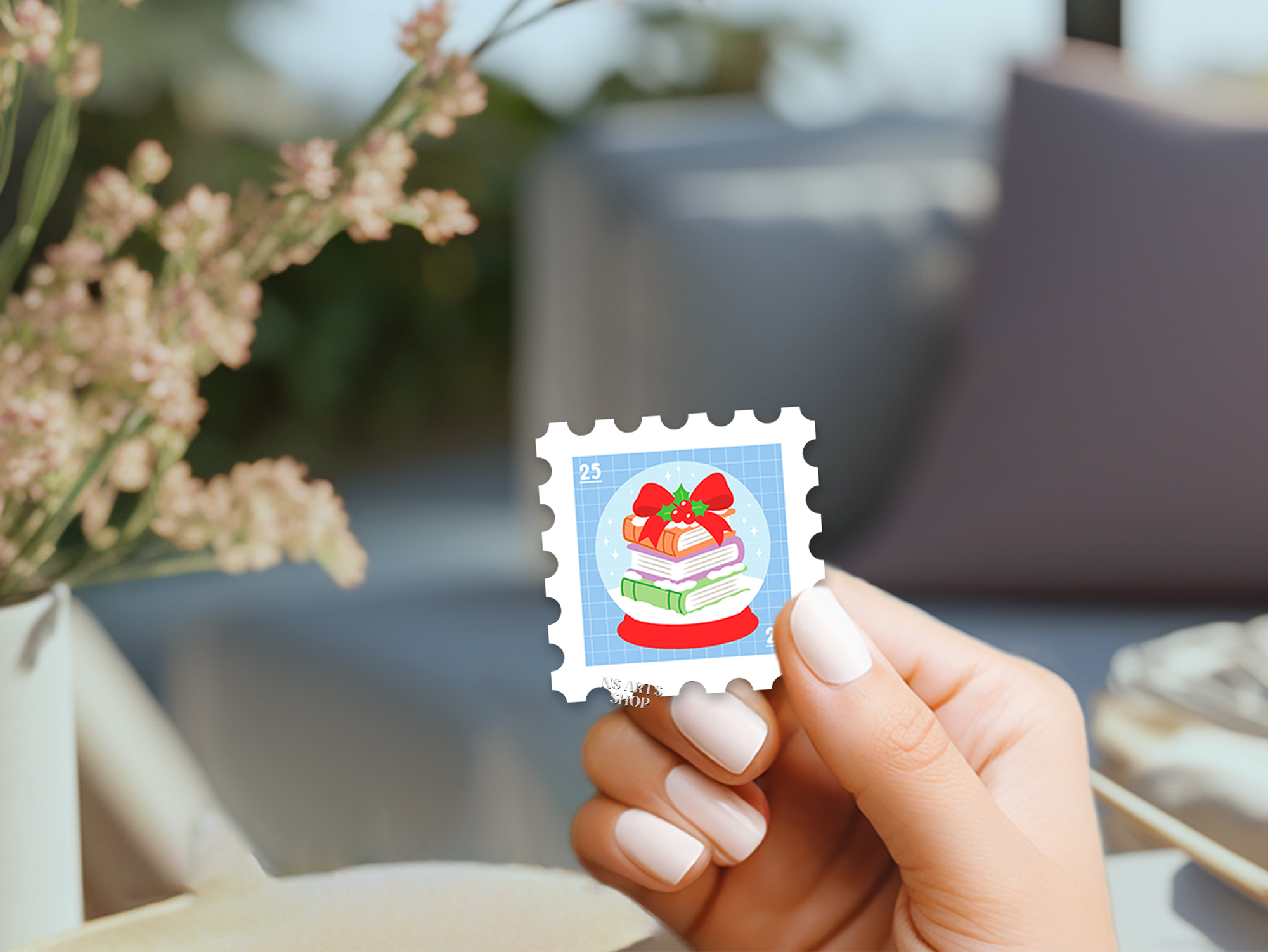 christmas-snow-globe-with-books-sticker-design.png