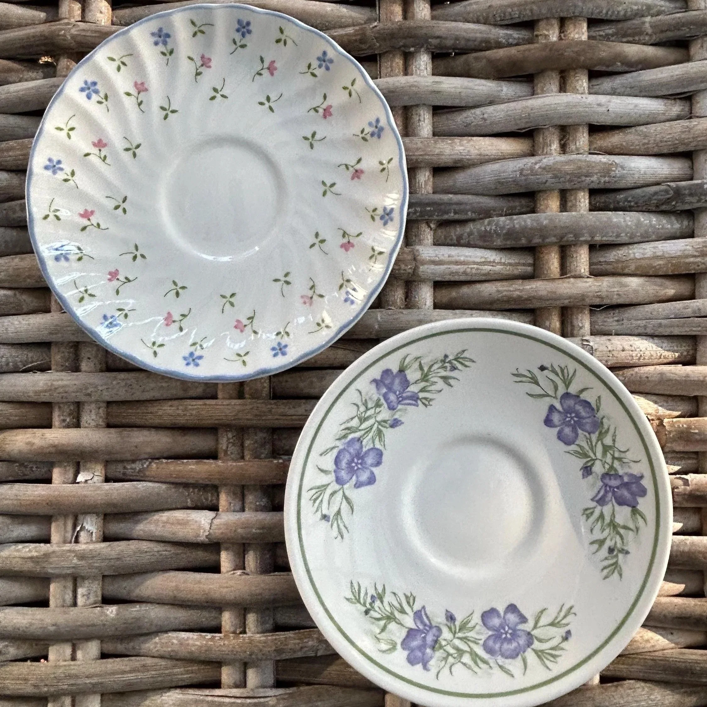 Top view of two vintage floral saucers – Churchill and Johnson Brothers