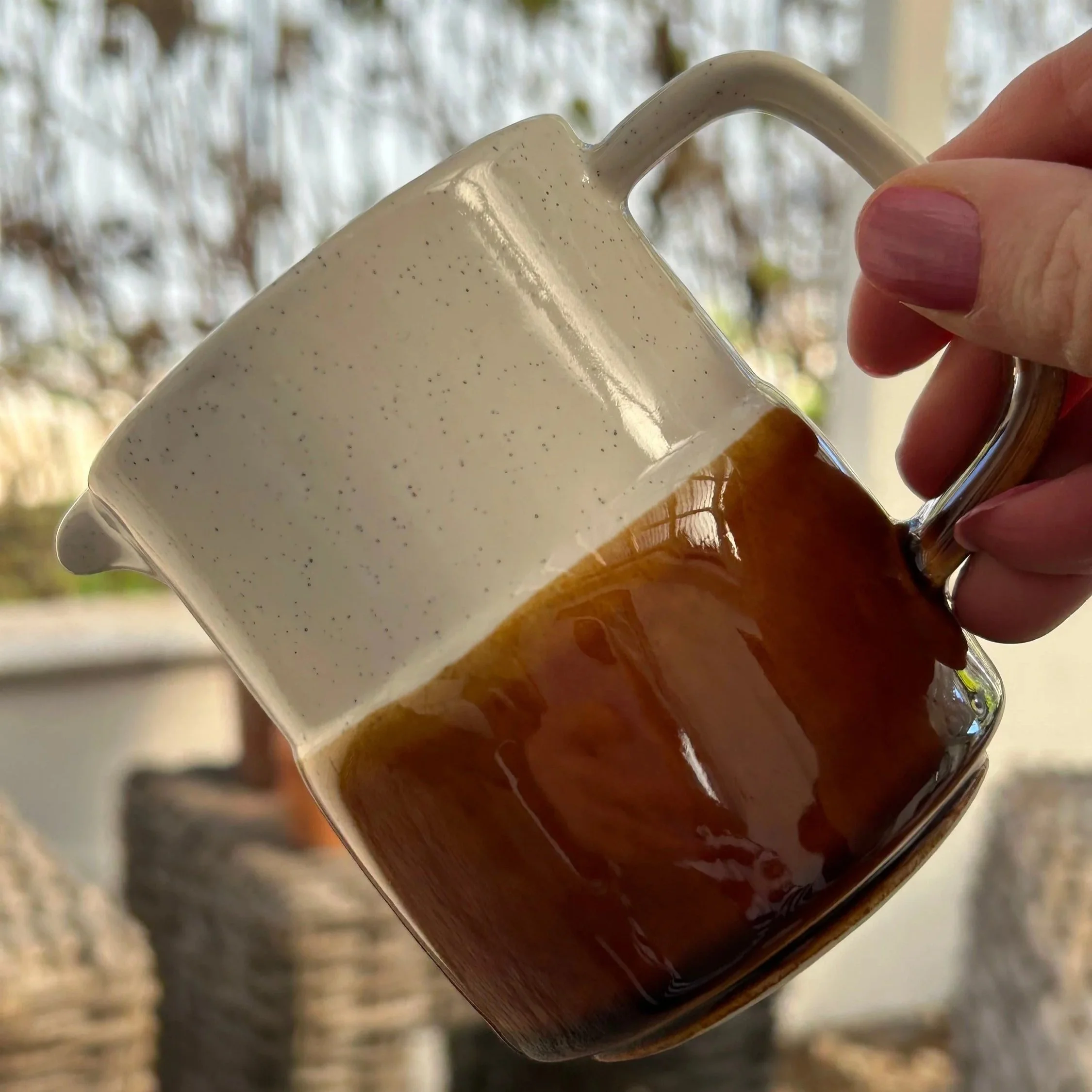 Overhead angled view into the jug showing the interior depth and spouted rim