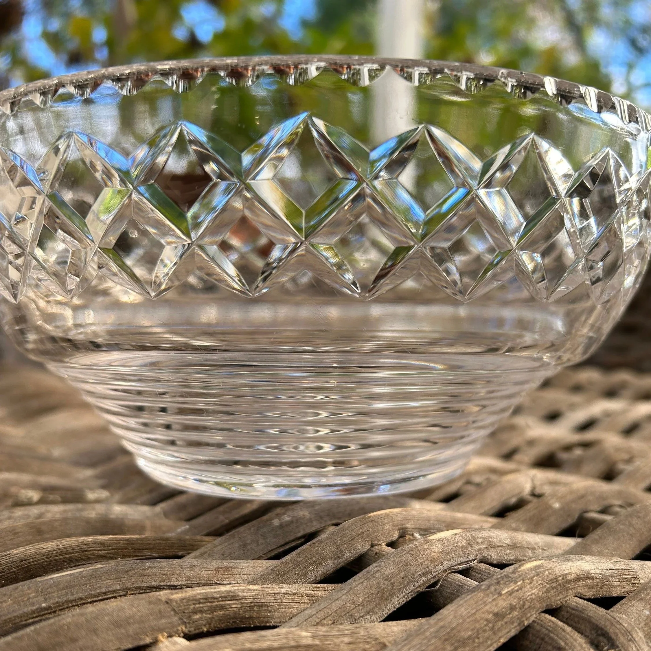Close side view of Stuart Crystal bowl highlighting the Stratford Rings diamond-cut band