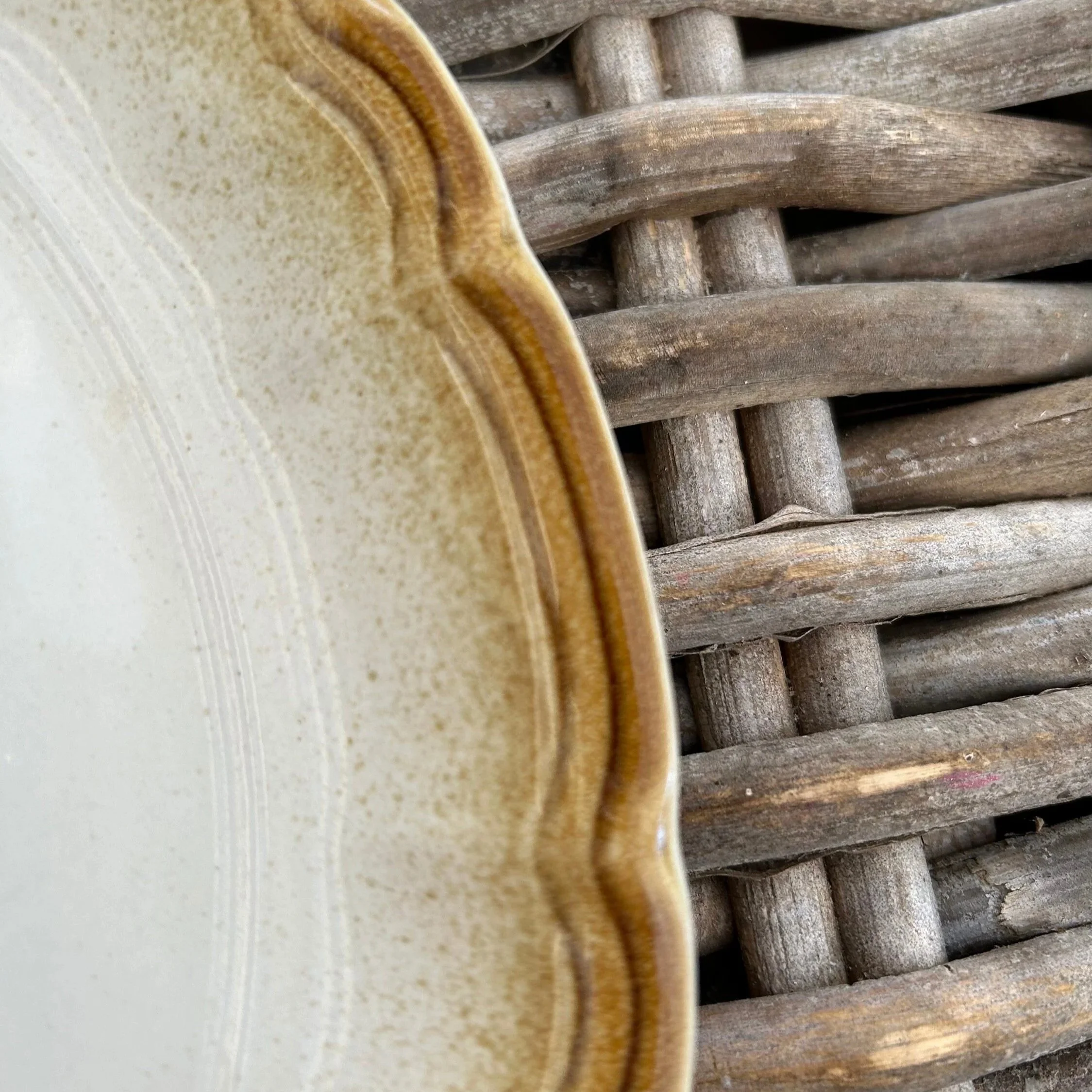 Scalloped brown rim detail of vintage Mikasa stoneware plate