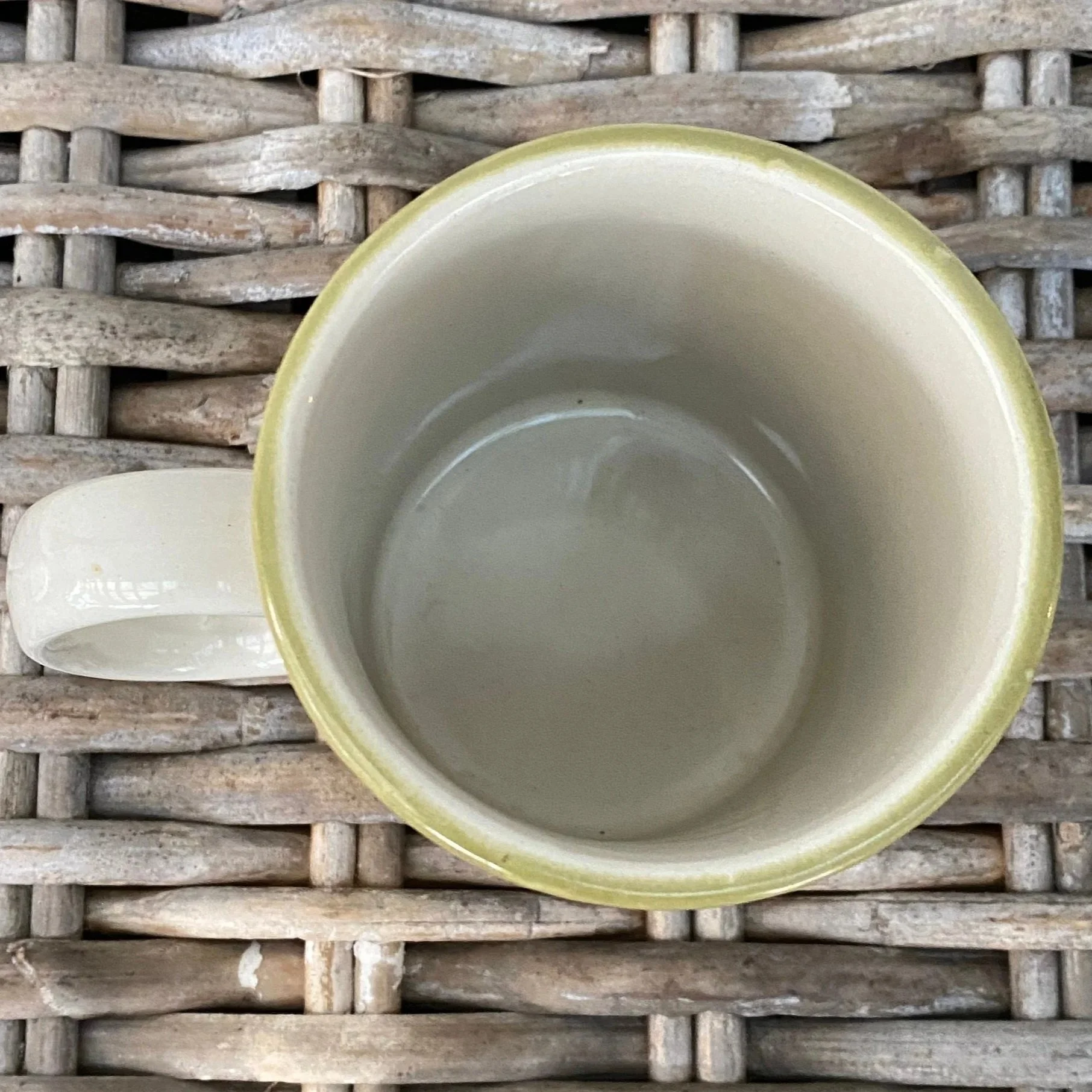 Overhead shot showing inside of mug with light green rim