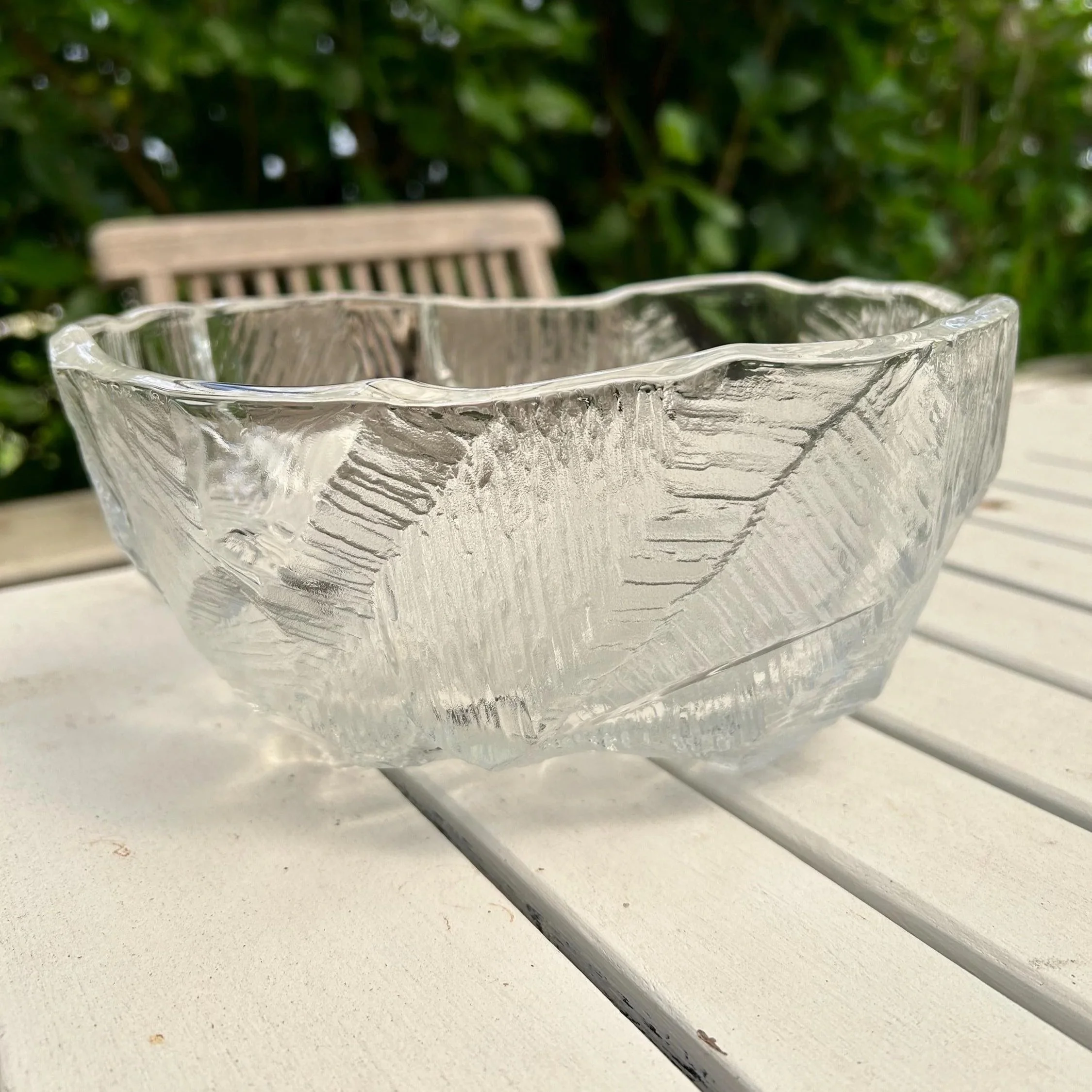 Side profile of textured Mikasa ice bowl with scalloped edge and thick glass