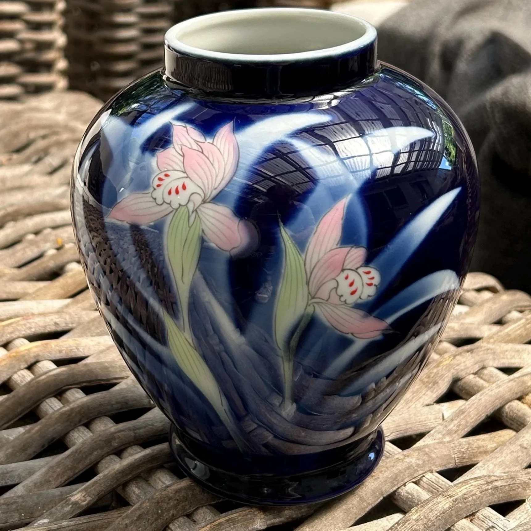 Detail of painted flowers on deep blue background