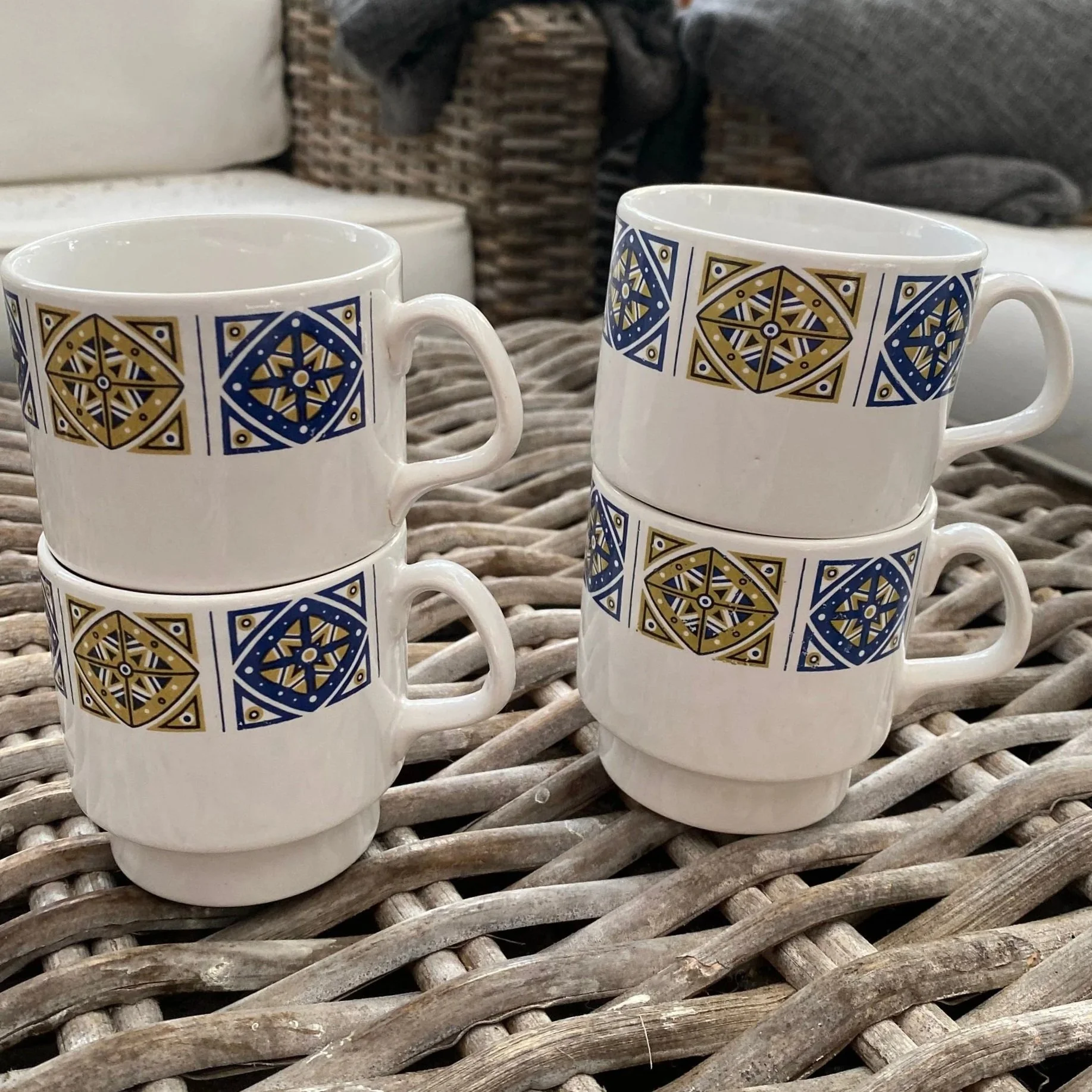 Two stacked pairs of mugs showing space-saving design