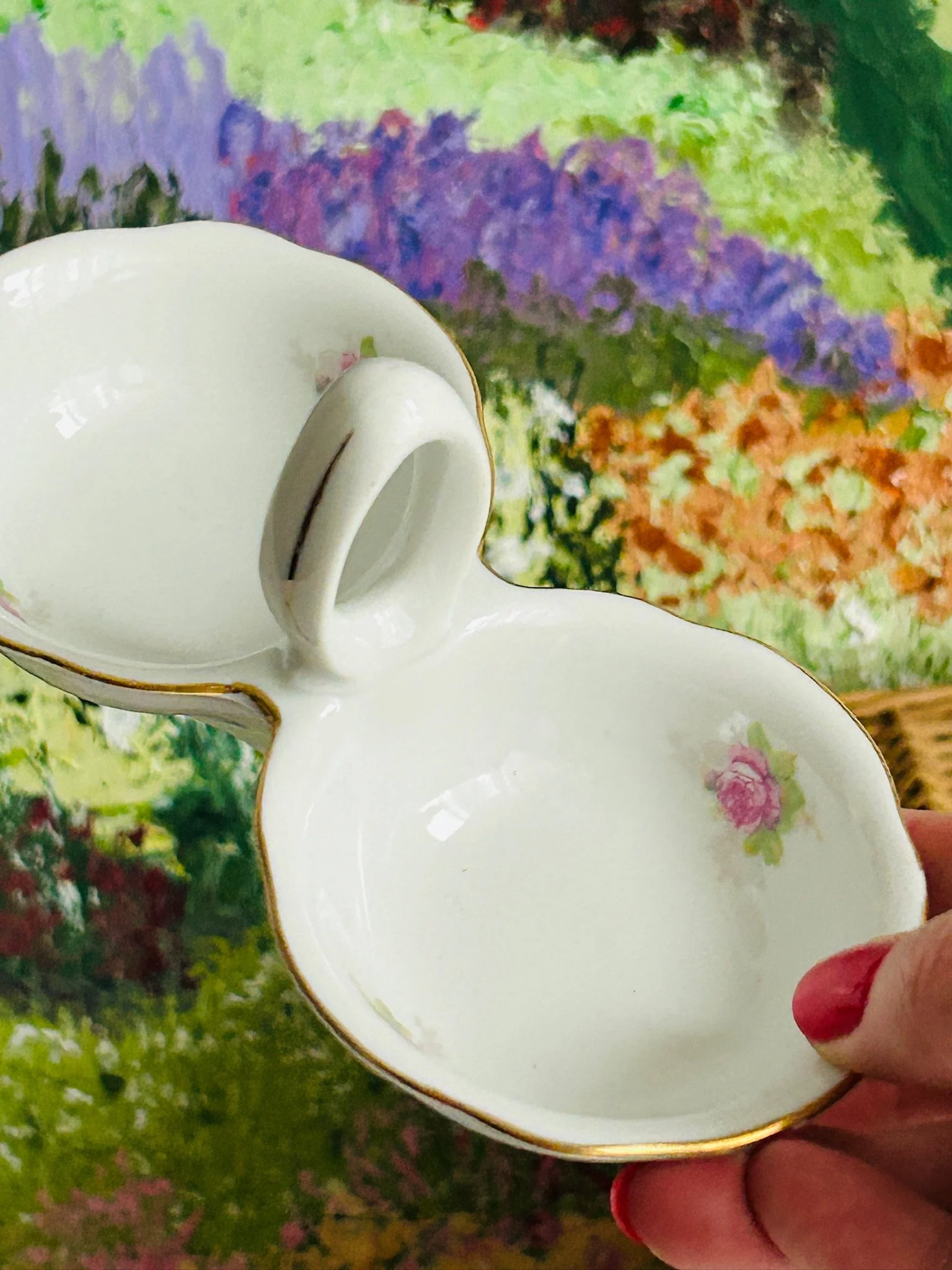 Angled top view of the double salt cellar showing both compartments and handle