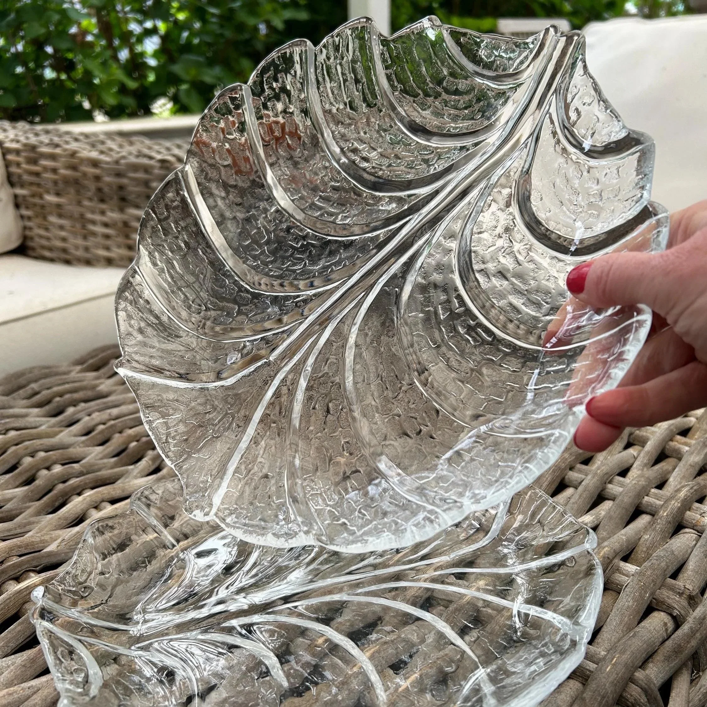 Close-up of Orrefors ‘Eden’ plate showing leaf-like shape and crystal detail