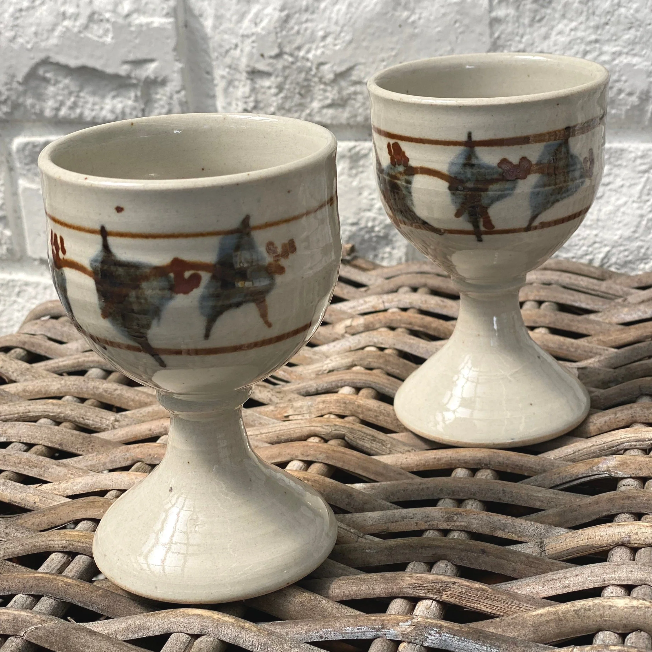 Pair of vintage stoneware goblets by Beaufort Pottery with hand-painted equestrian motifs. Made in Perth, Australia pre-1987. Rustic and collectable.