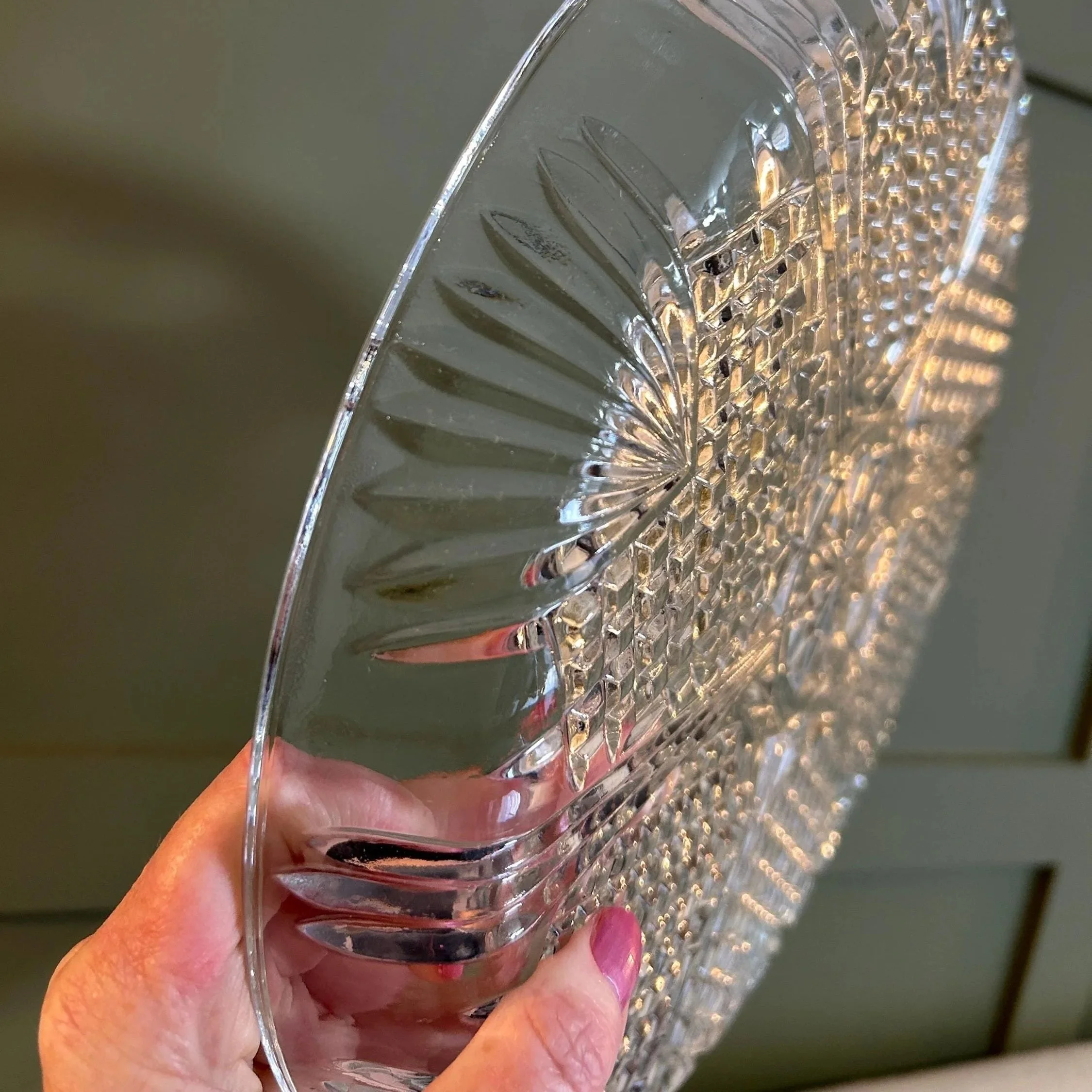 Angled view highlighting detailed cut crystal pattern.