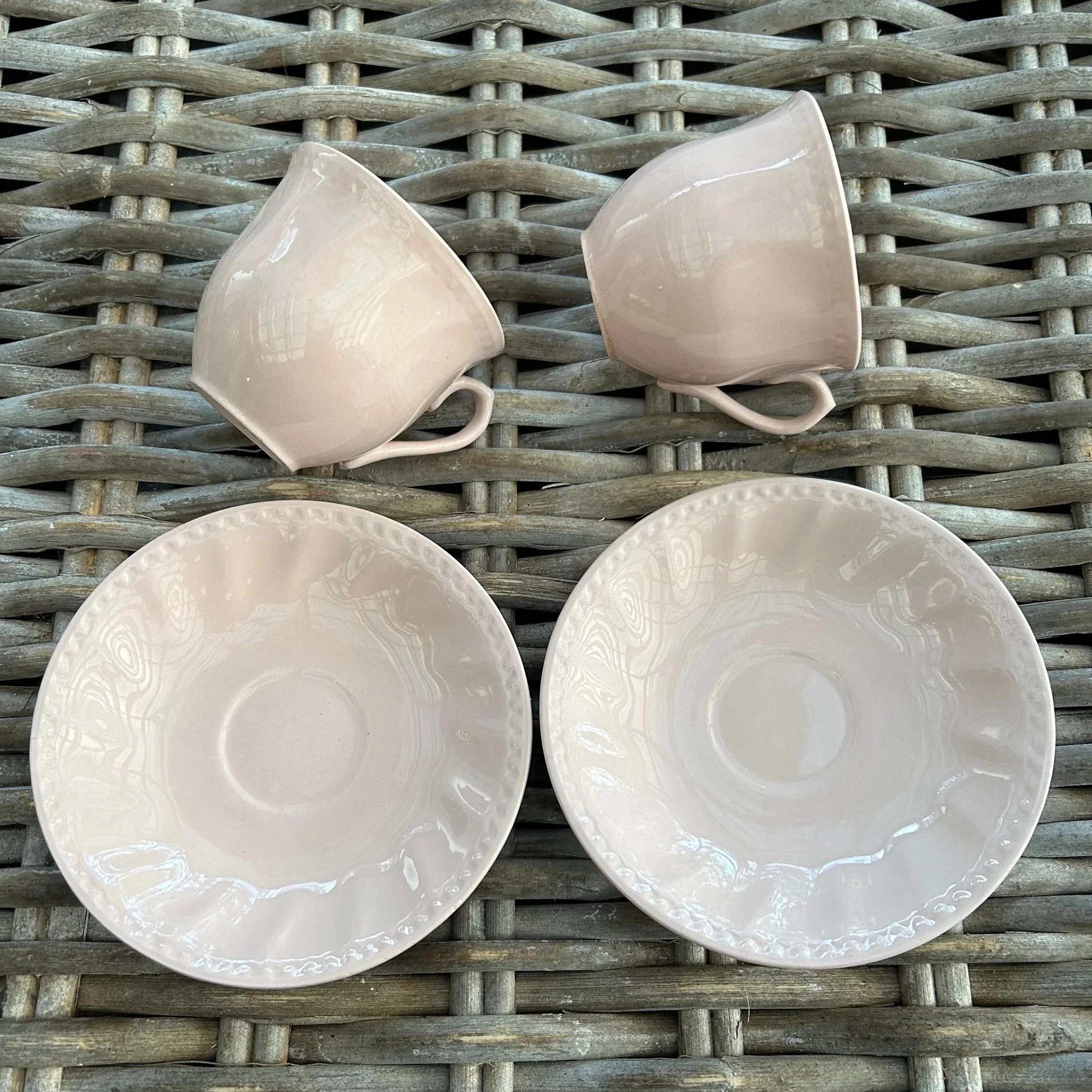 Top-down layout of both cups and saucers
