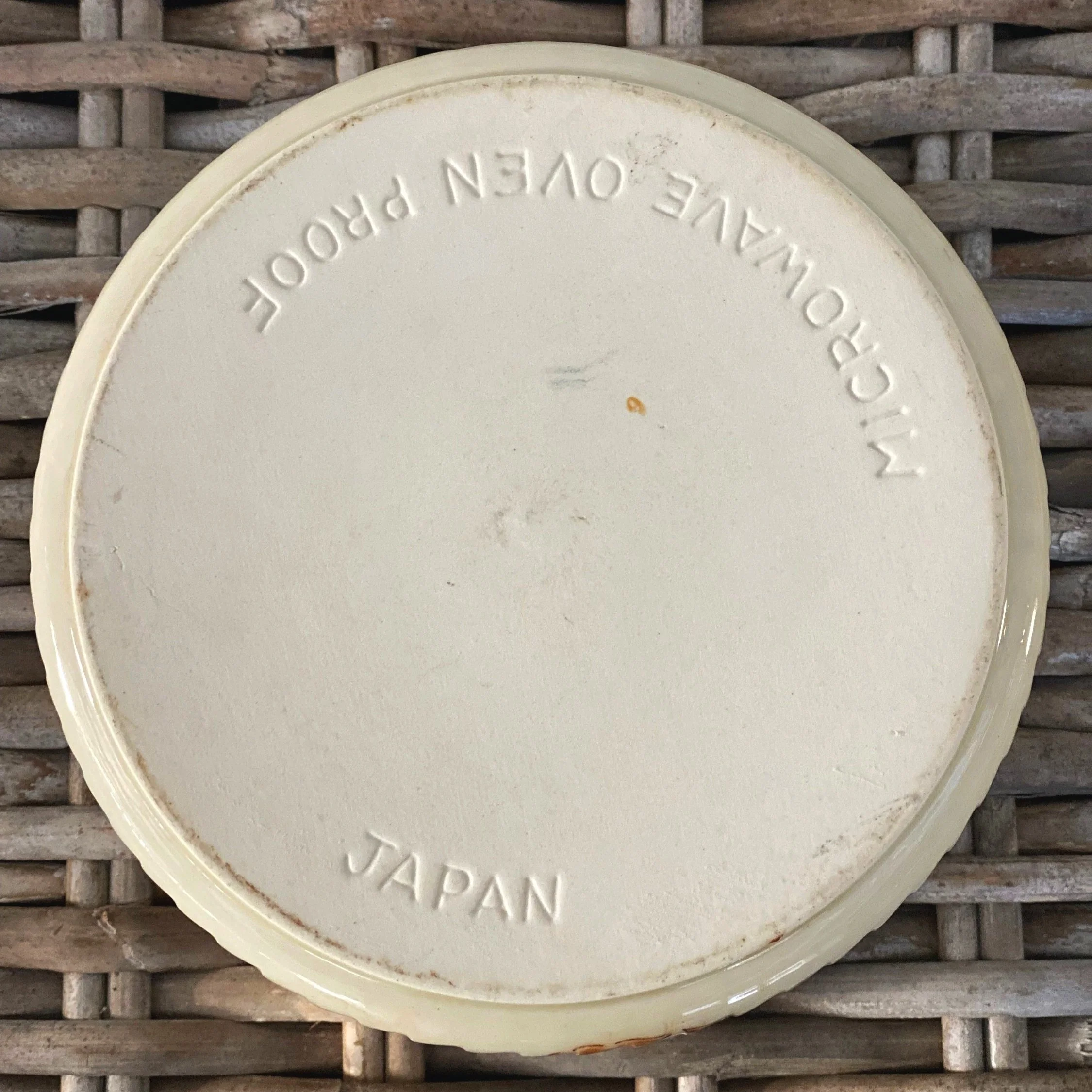 Underside showing “Microwave Oven Proof – Japan” stamp
