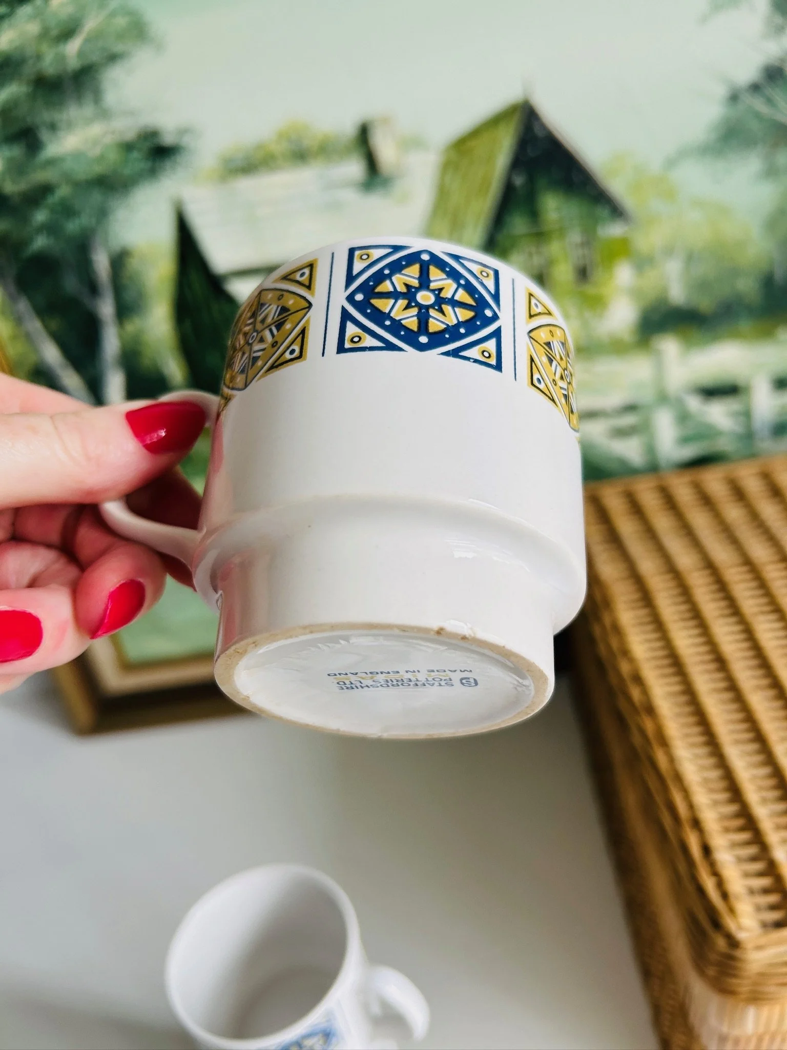 Underside view of cup showing Staffordshire Potteries Ltd Midas maker’s mark and Made in England stamp.