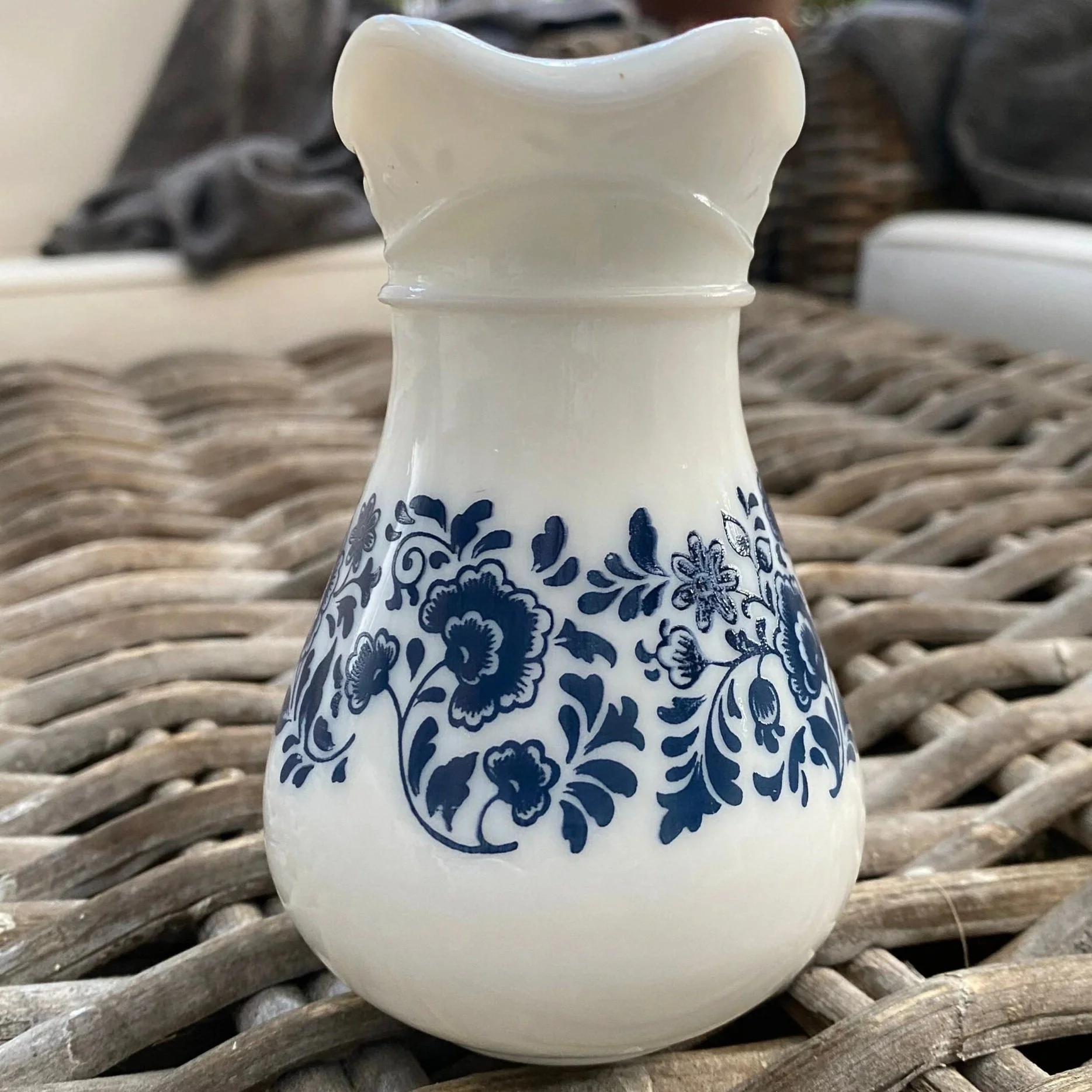 Rear view showing curved handle and neck of pitcher