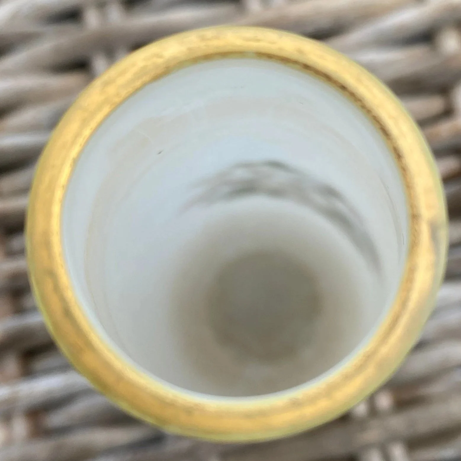 Top-down view revealing gold rim and hand-blown interior texture