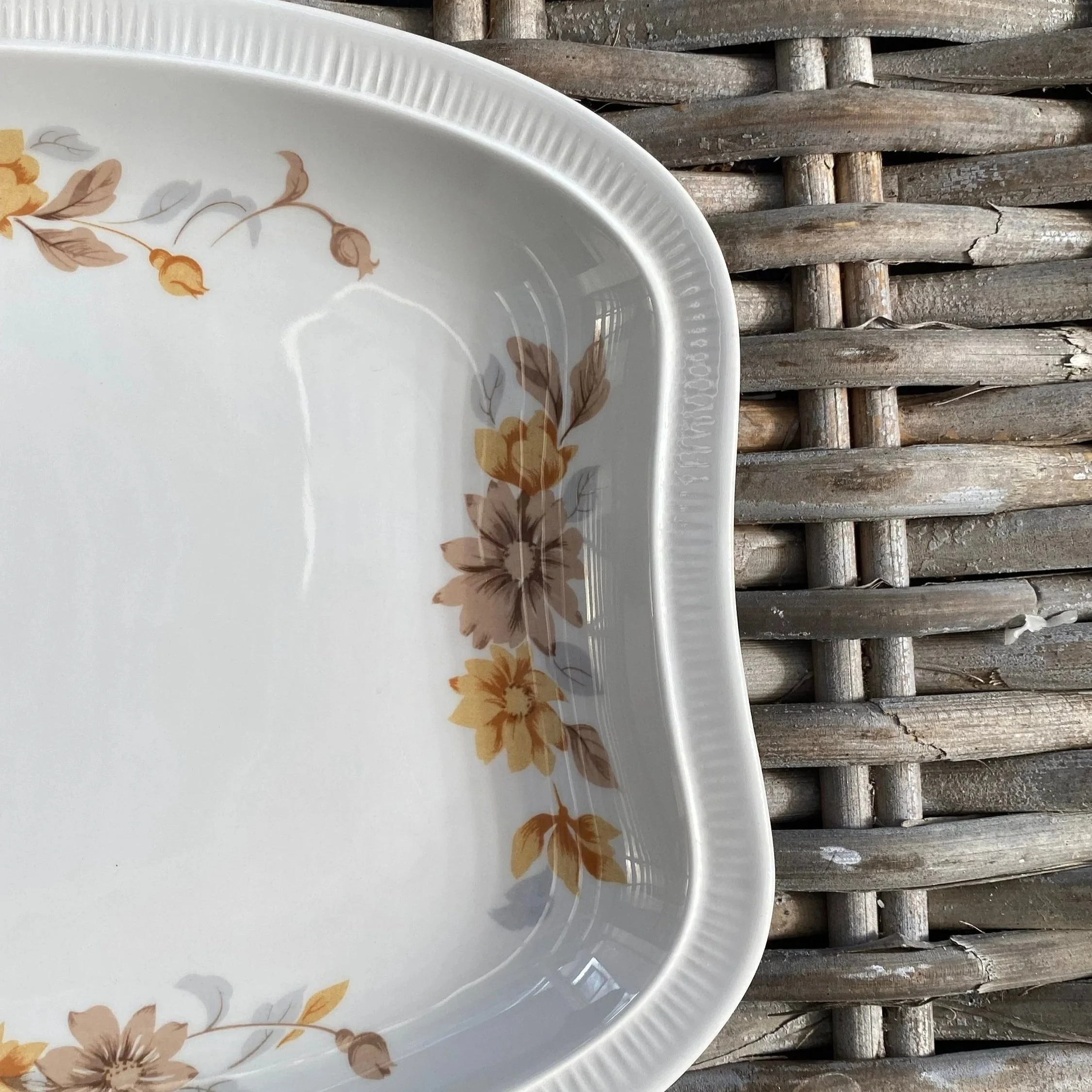 Interior corner view highlighting mustard and brown flower motif