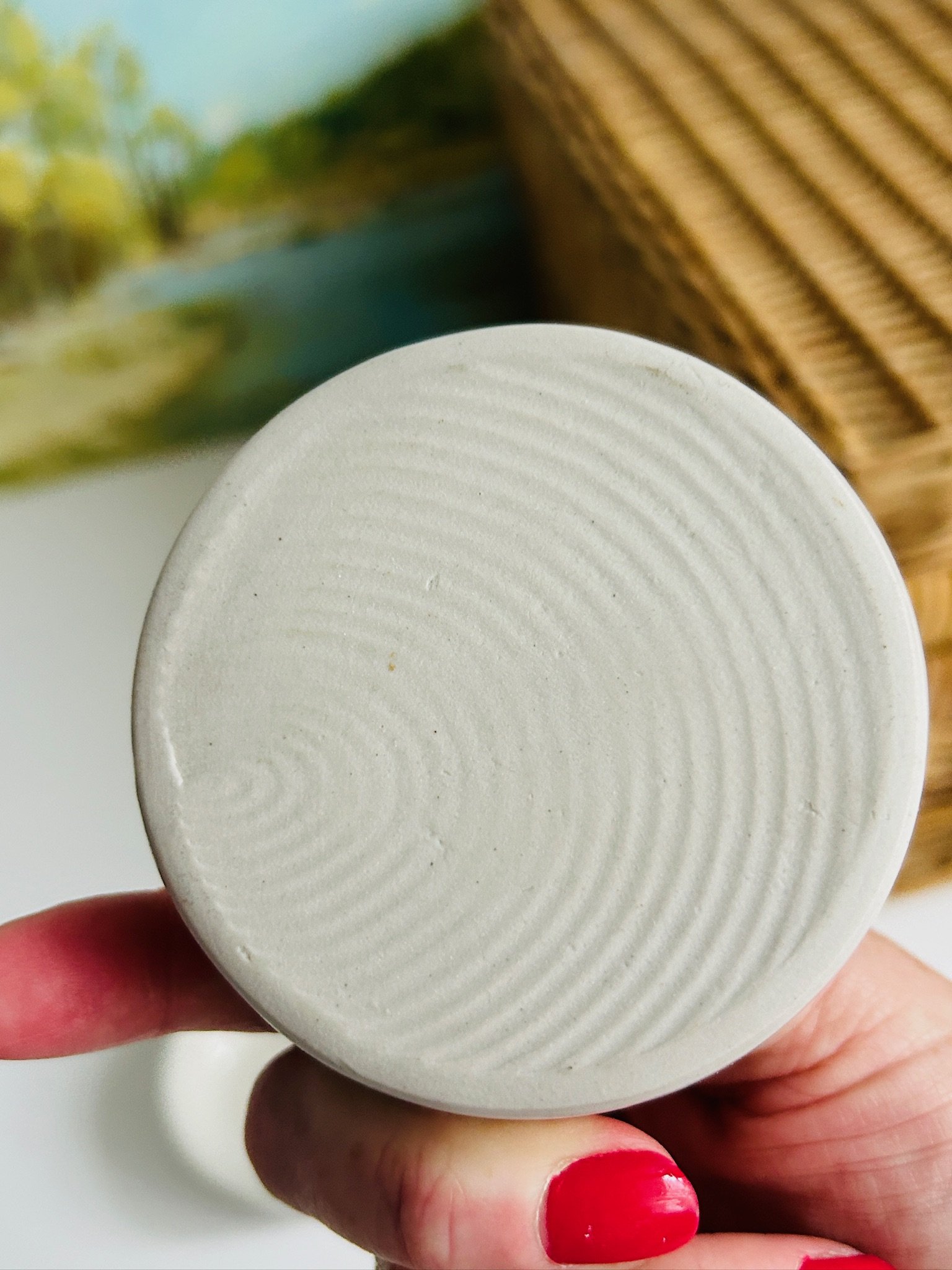 Base underside of one bowl showing concentric ring texture