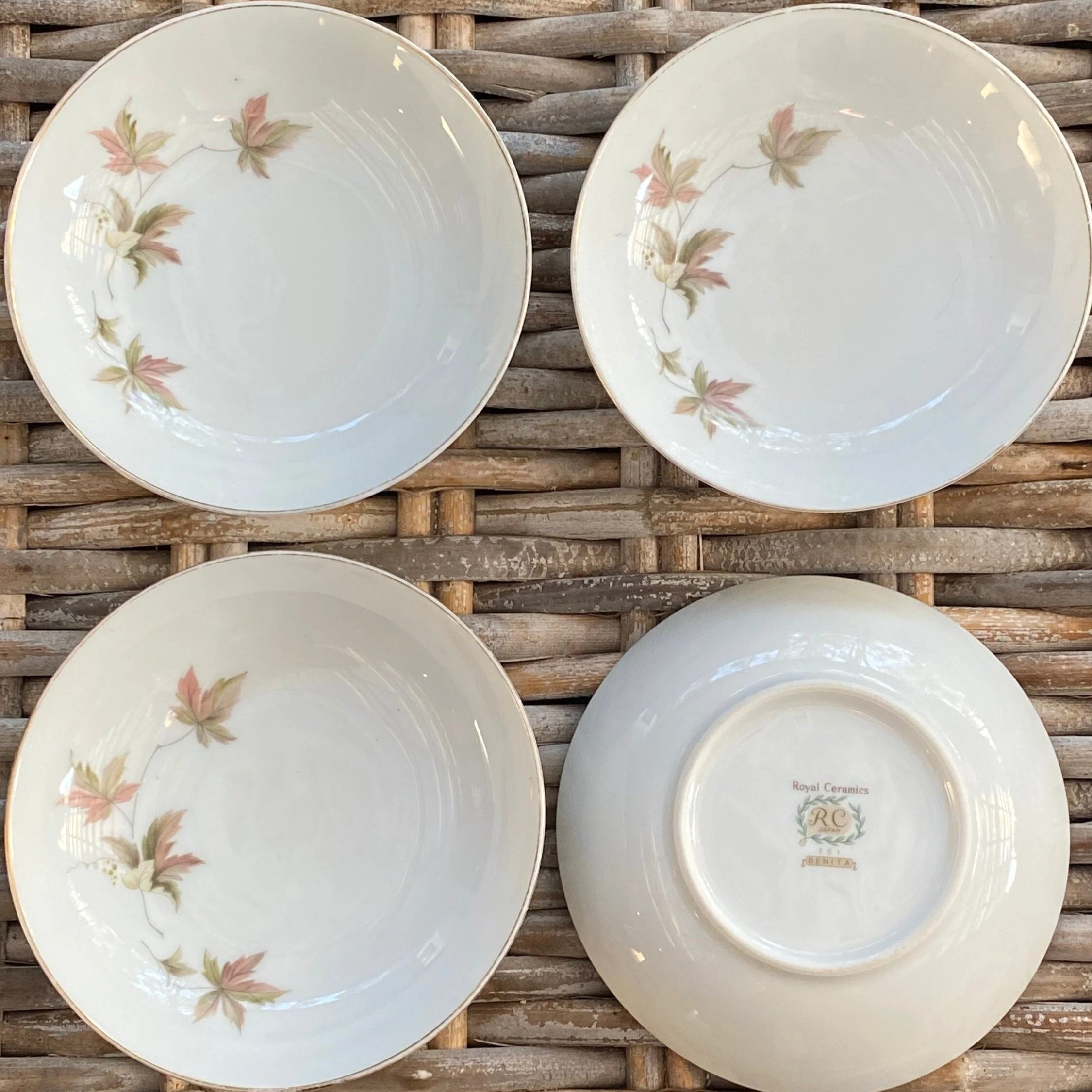 Set of four Royal Ceramics Benita 751 side dishes laid out on wicker background