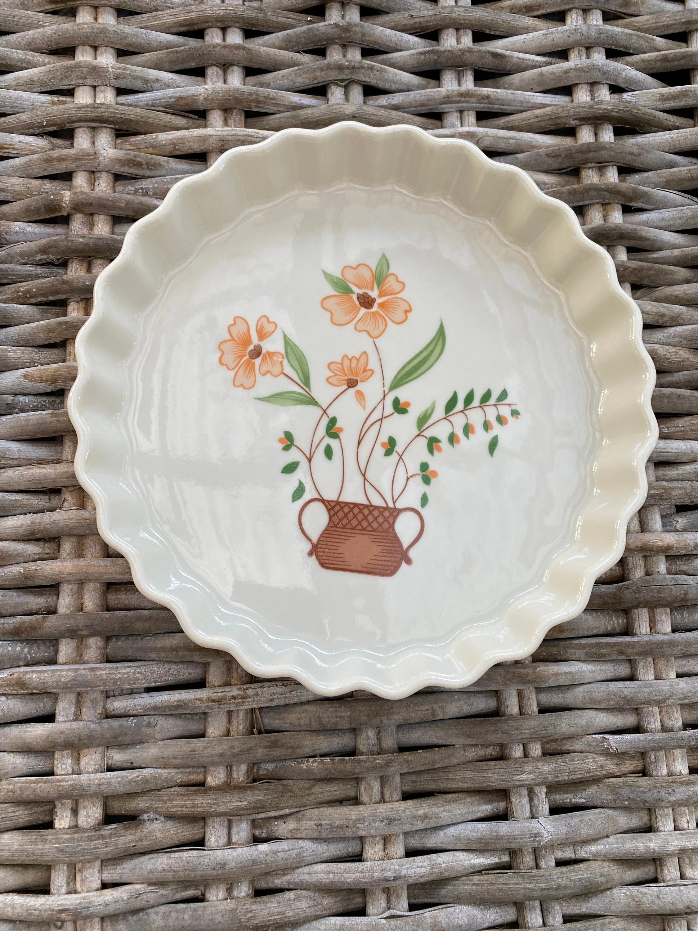 Angled view of dish showing its shallow height and rustic style