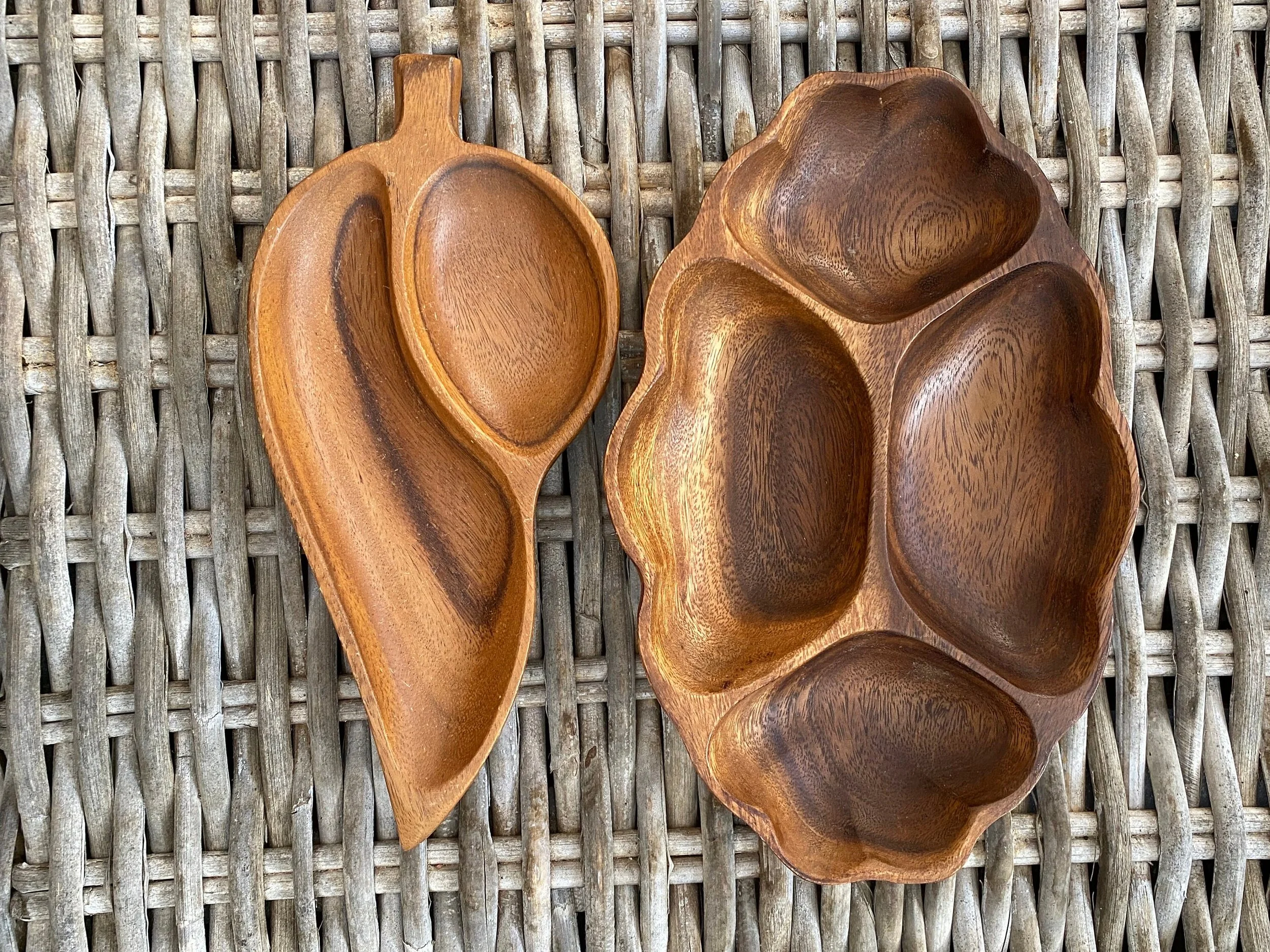 Two hand-carved Monkey Pod trays – leaf and scalloped styles. Made in the Philippines, vintage, artisan hardwood serveware with beautiful grain.