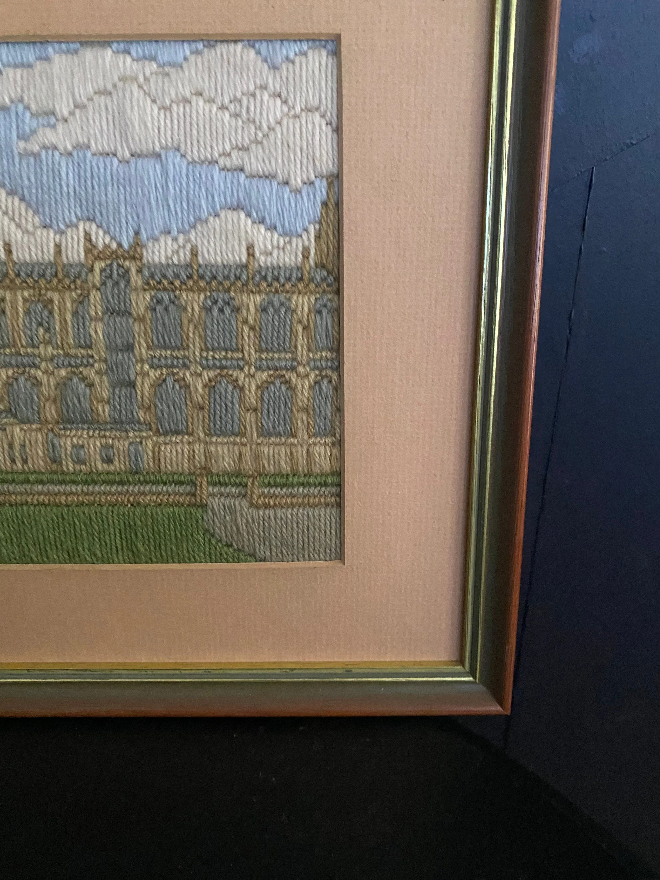 Close-up of the lower right section of the artwork showing cathedral windows, pathway, and mat border