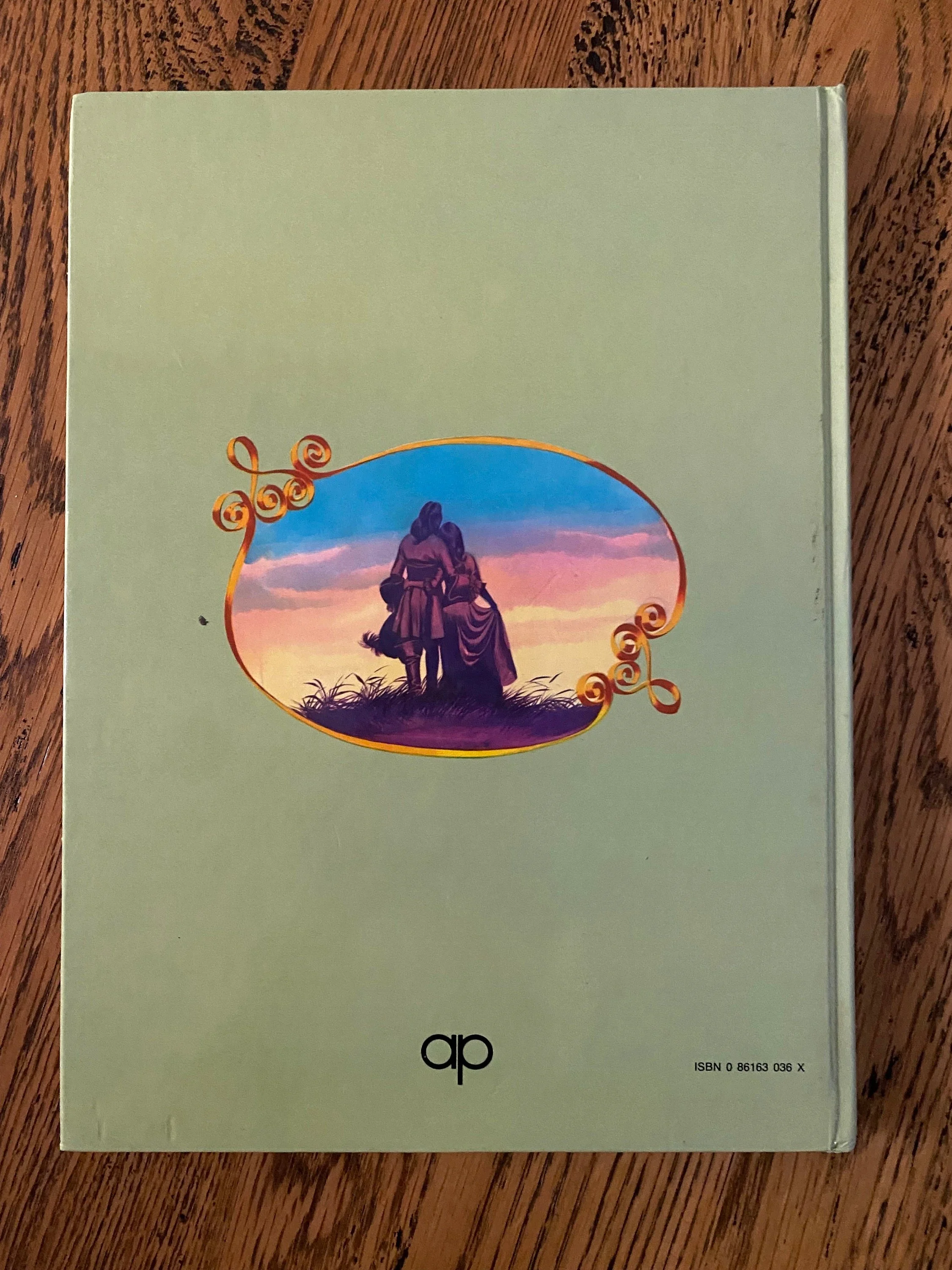 Back cover featuring castle vignette on mint green background