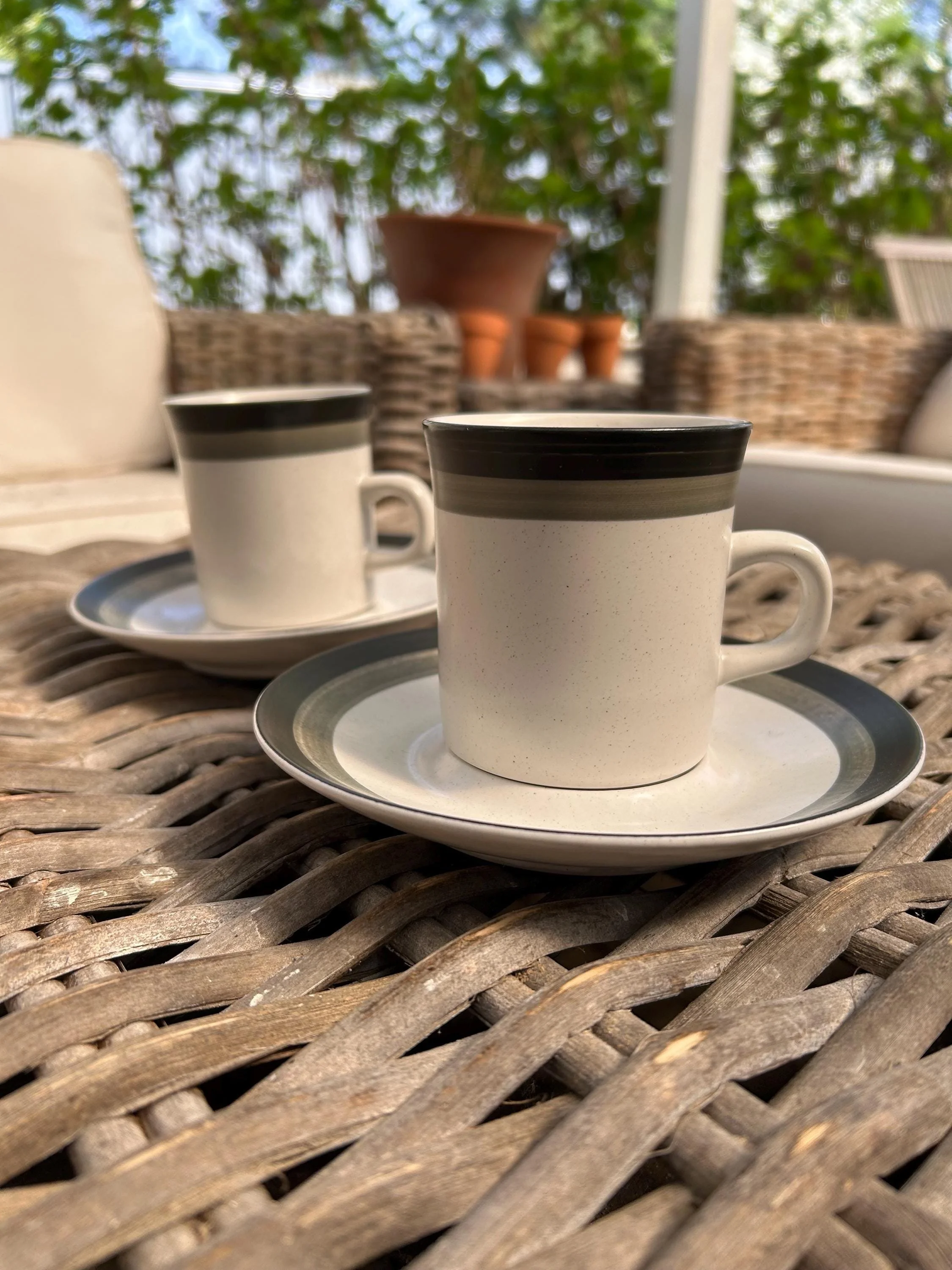 Vintage Kasuga Arrowstone Black Foot tea/coffee cup & saucer set. Mid-century stoneware from Japan with black and grey banded design – set of two.