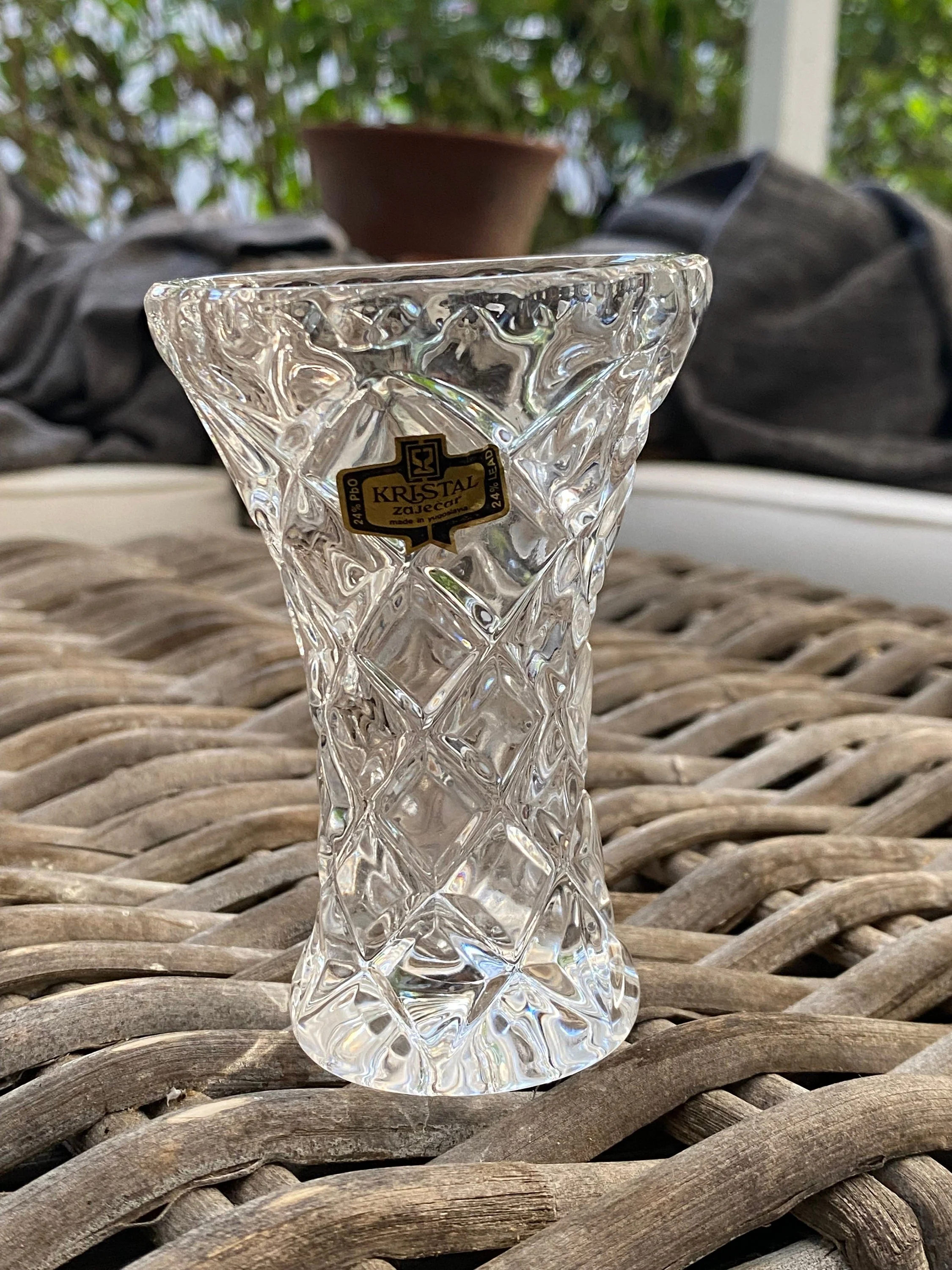 Side view of the Zajecar posy vase showing the scalloped rim and tapering waist