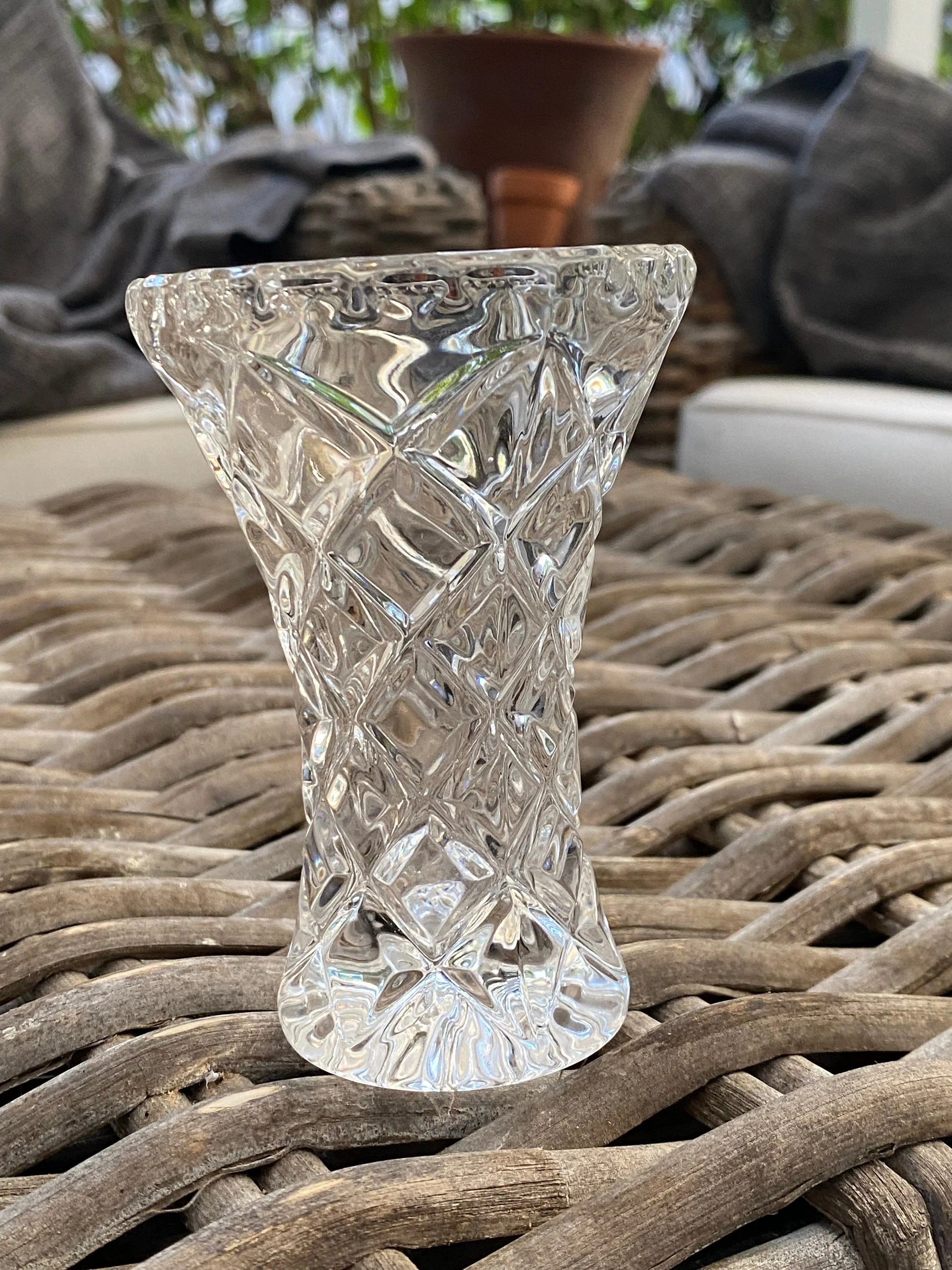 Front view of the vintage crystal vase highlighting the diamond-cut design and flared rim