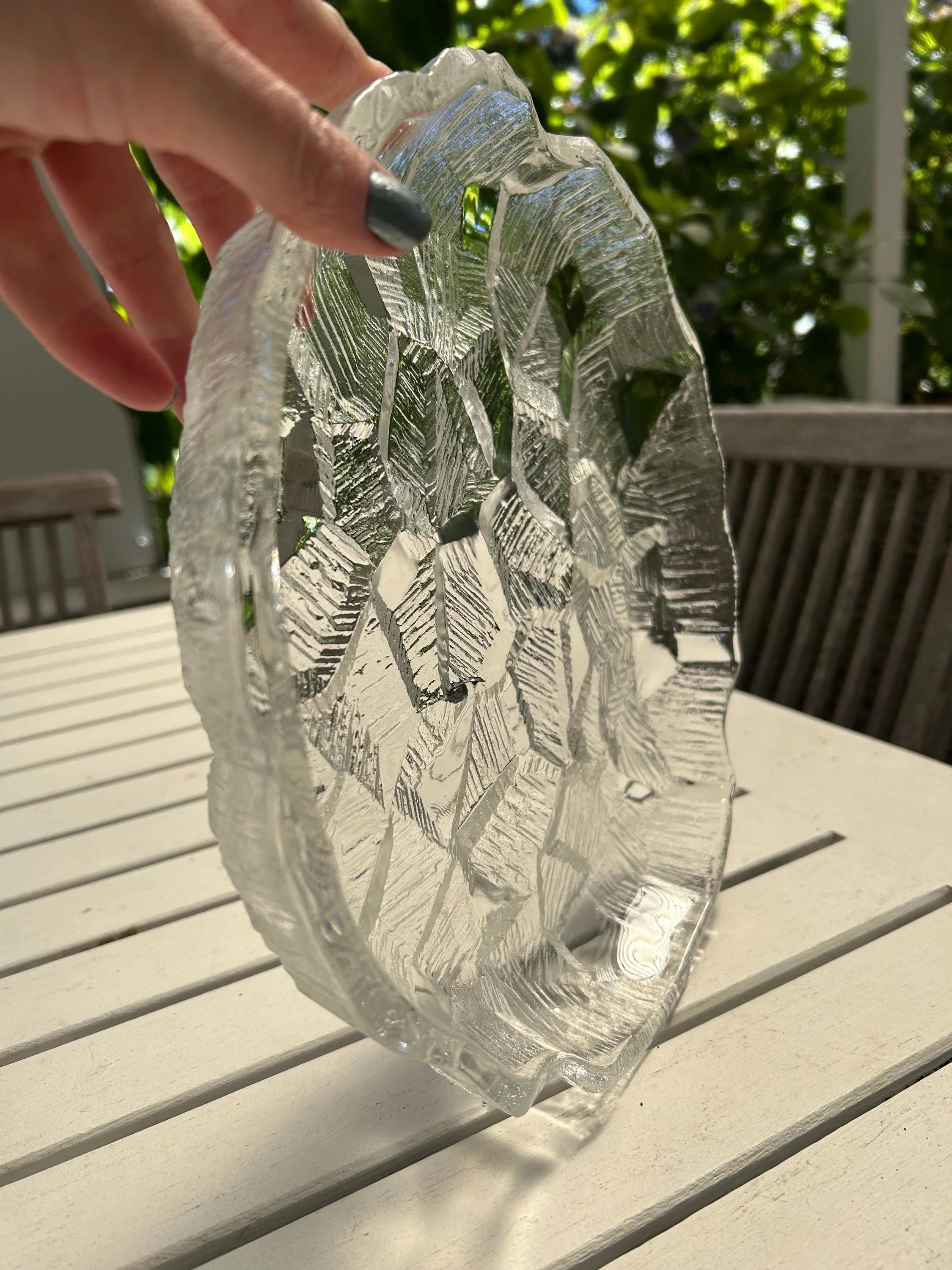 Bowl held upright to reveal thickness and sculpted edge