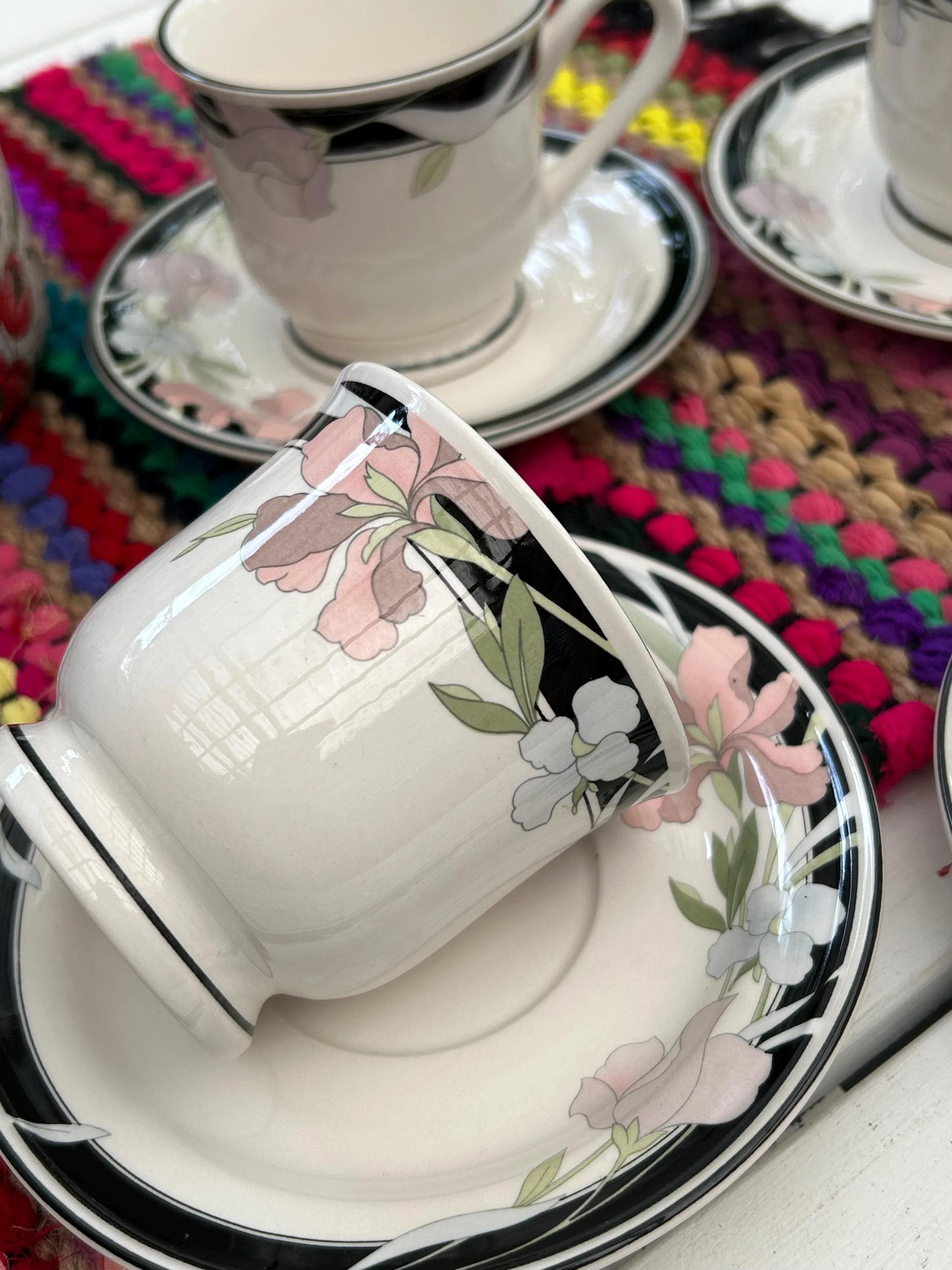 Cup close-up showing handle shape and glossy finish