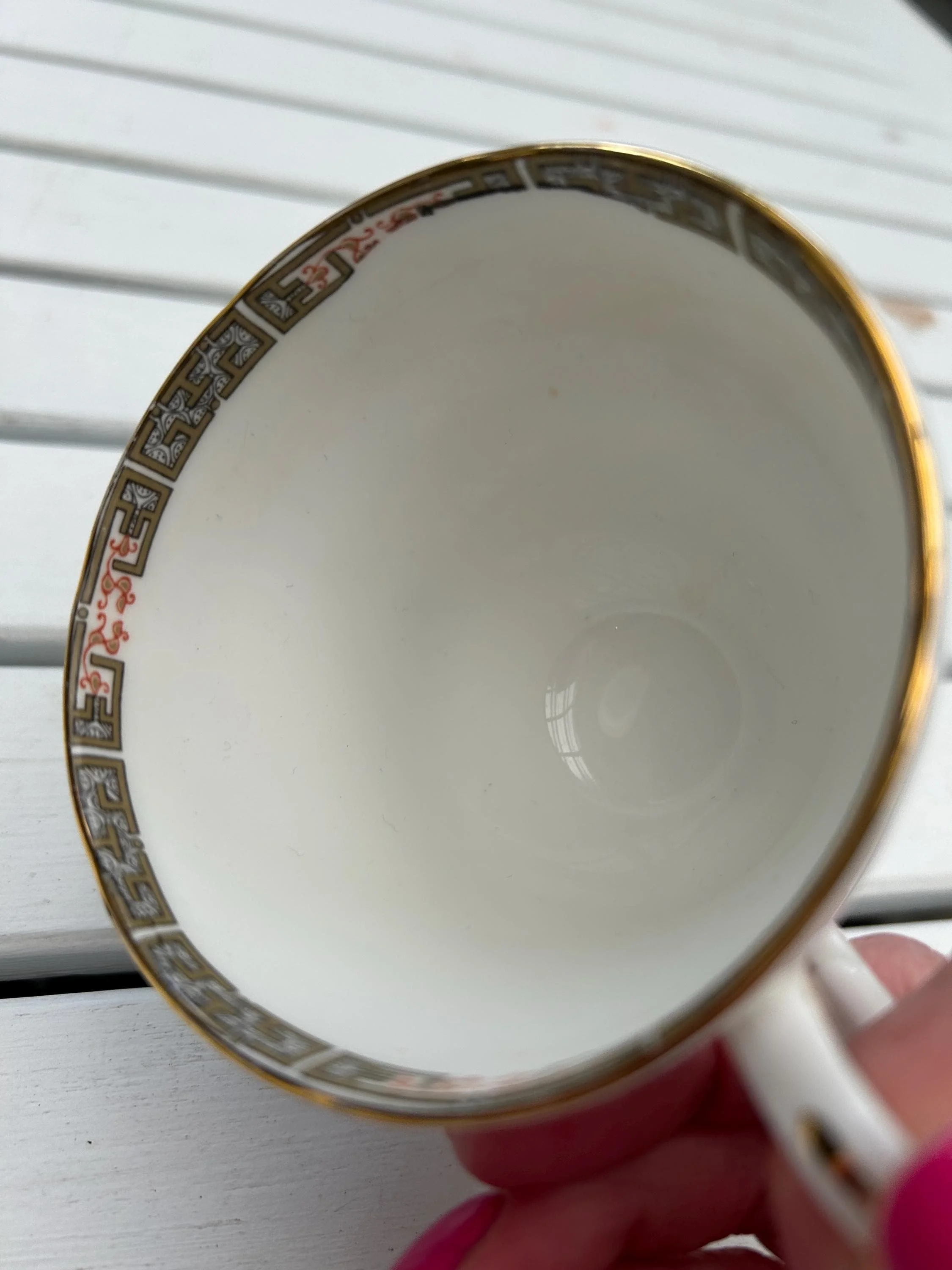 Inside view showing geometric gold border and clean interior