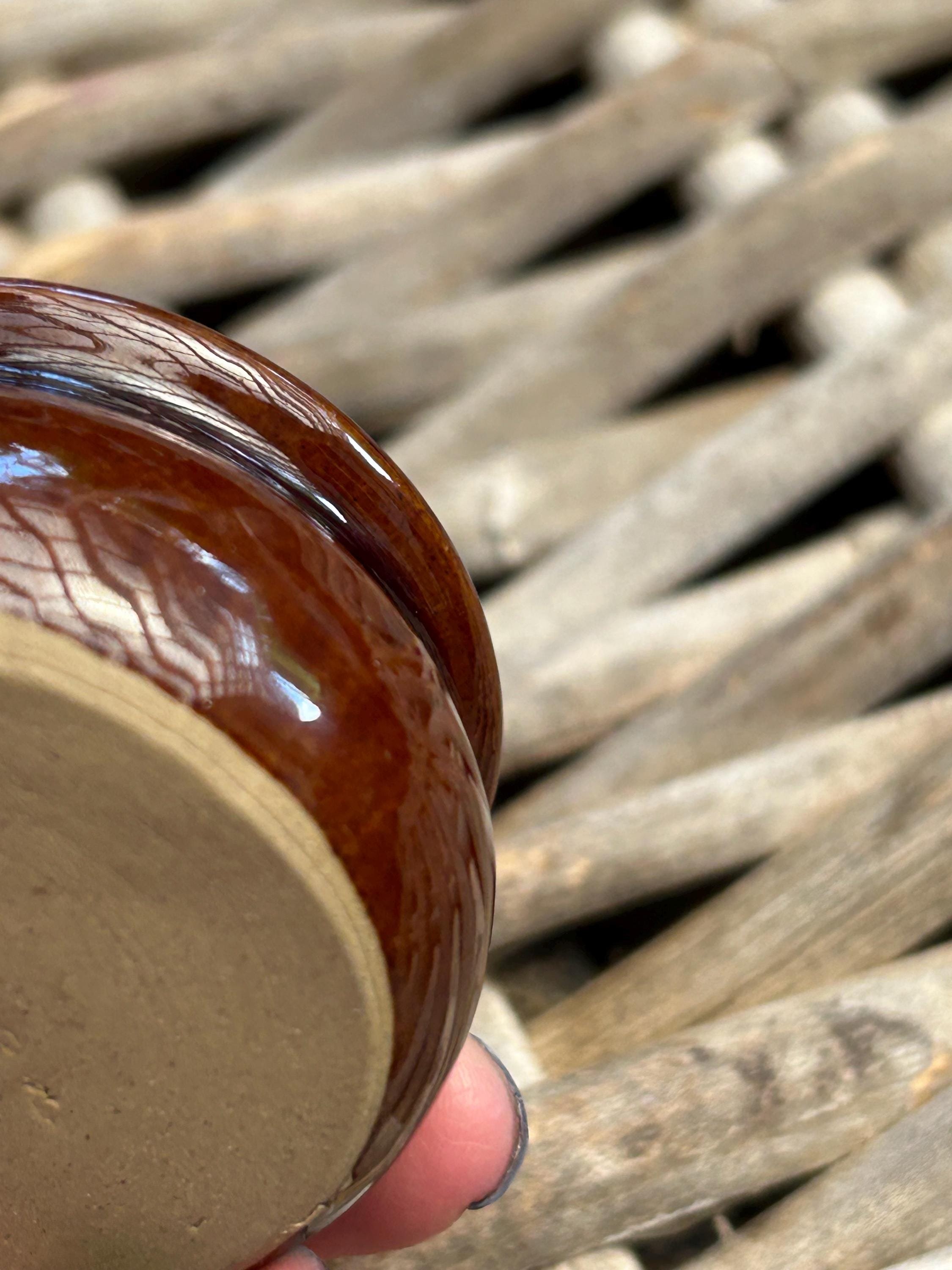 Side angle of the salt cellar showing glaze detail and shape