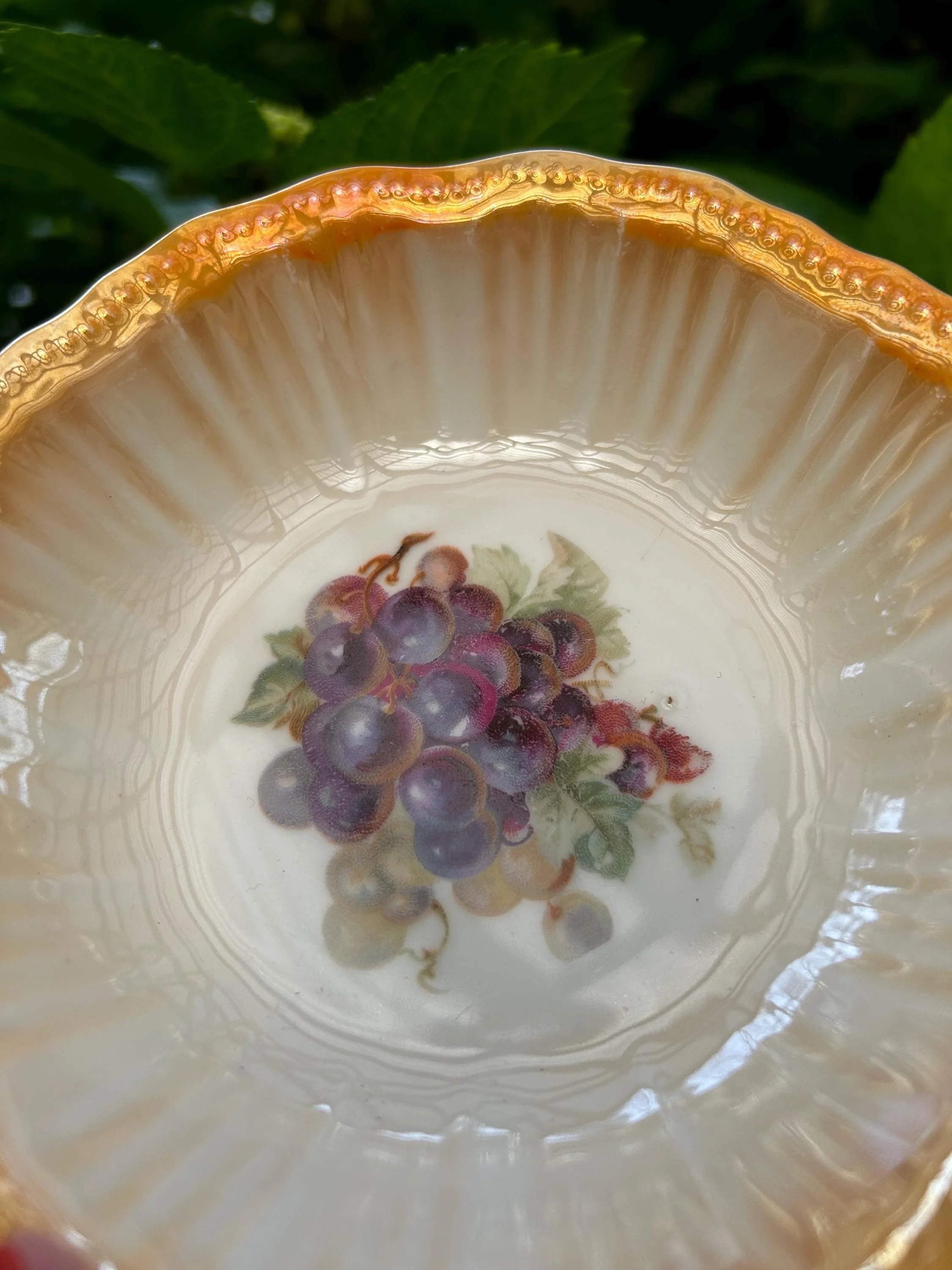 Detail of textured orange and yellow scalloped rim