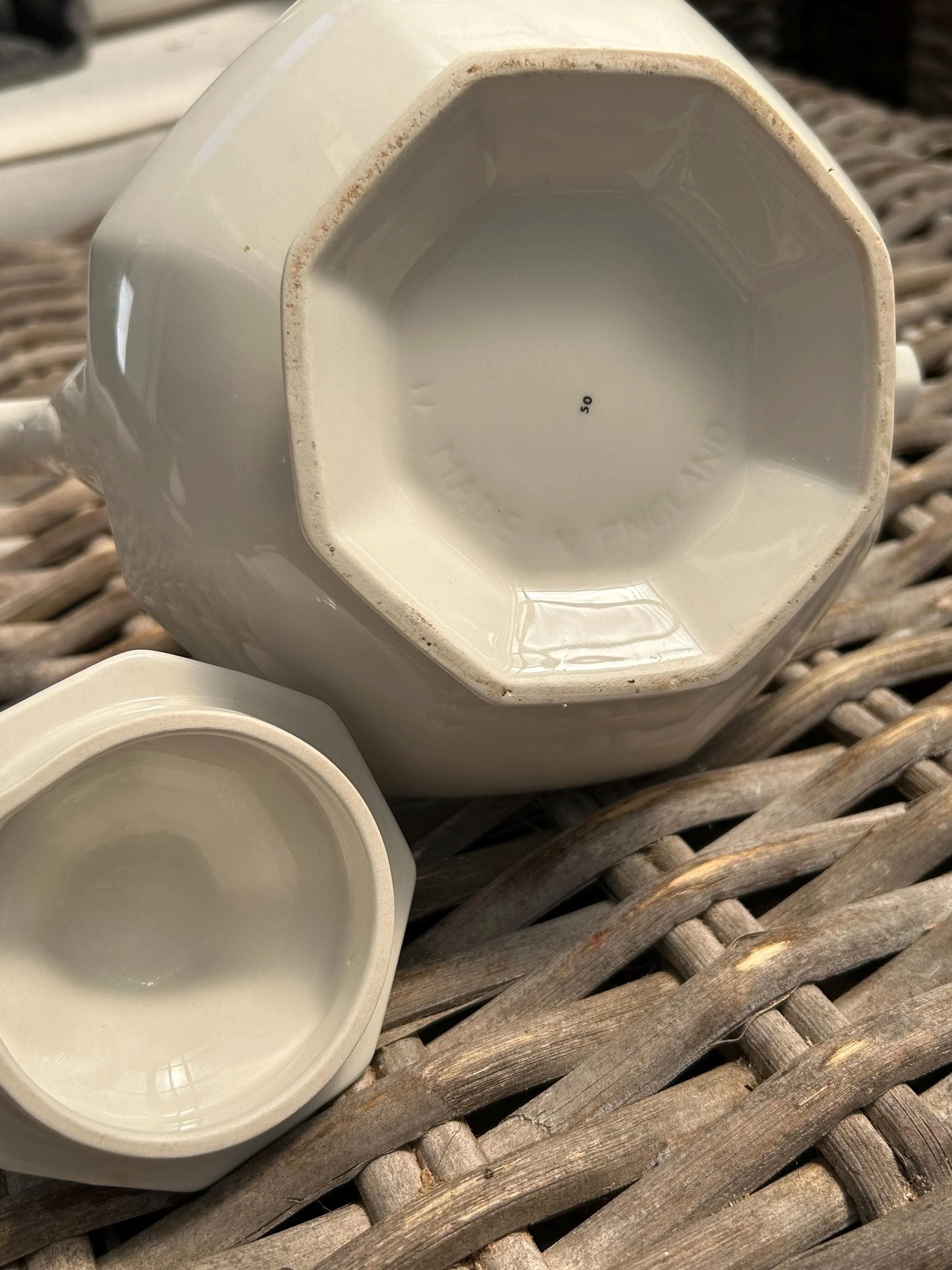 Underside of teapot showing octagonal base and embossed stamp