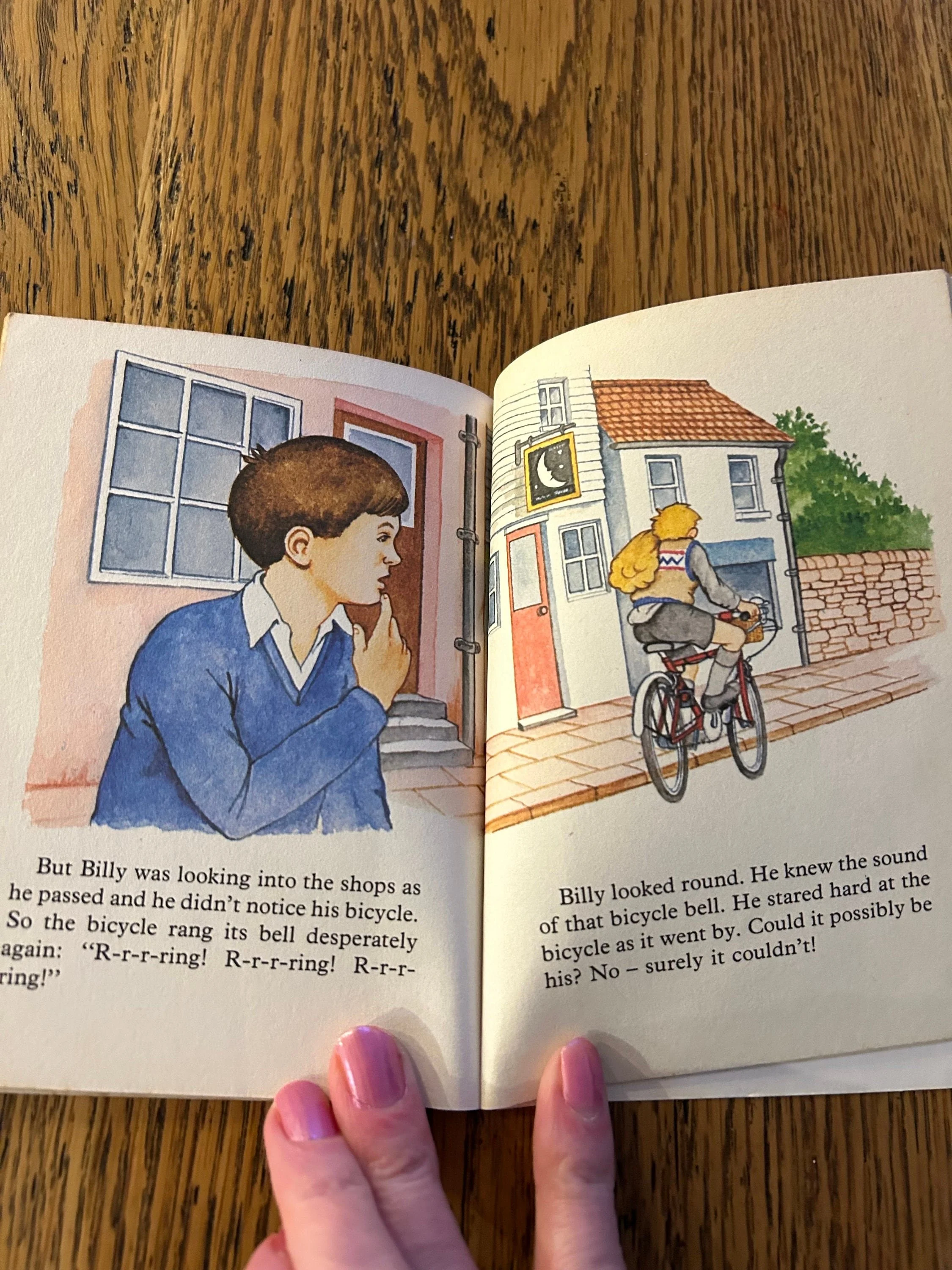 Illustrated page with Billy looking out at a cyclist