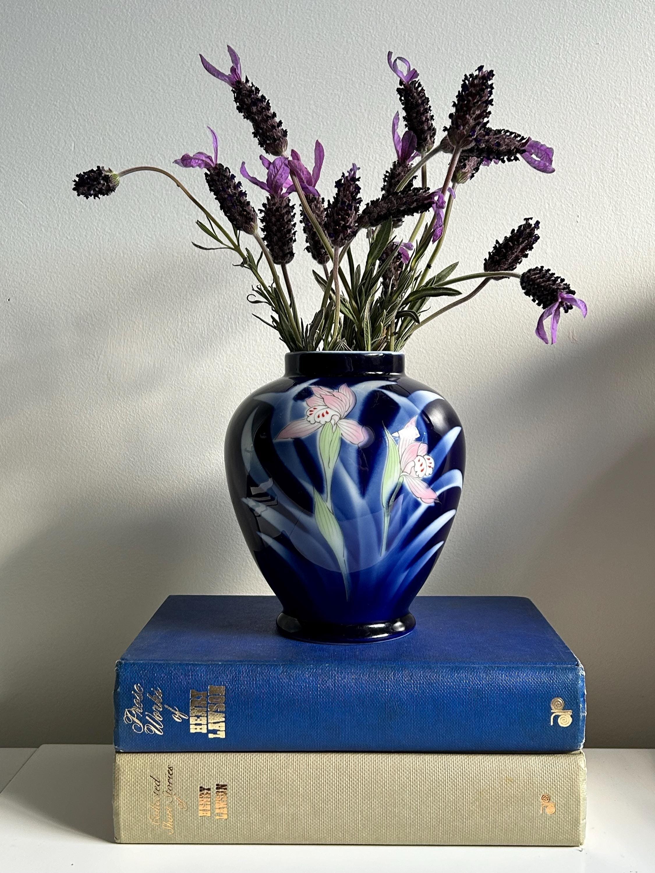 Front view of Japanese porcelain vase filled with lavender stems