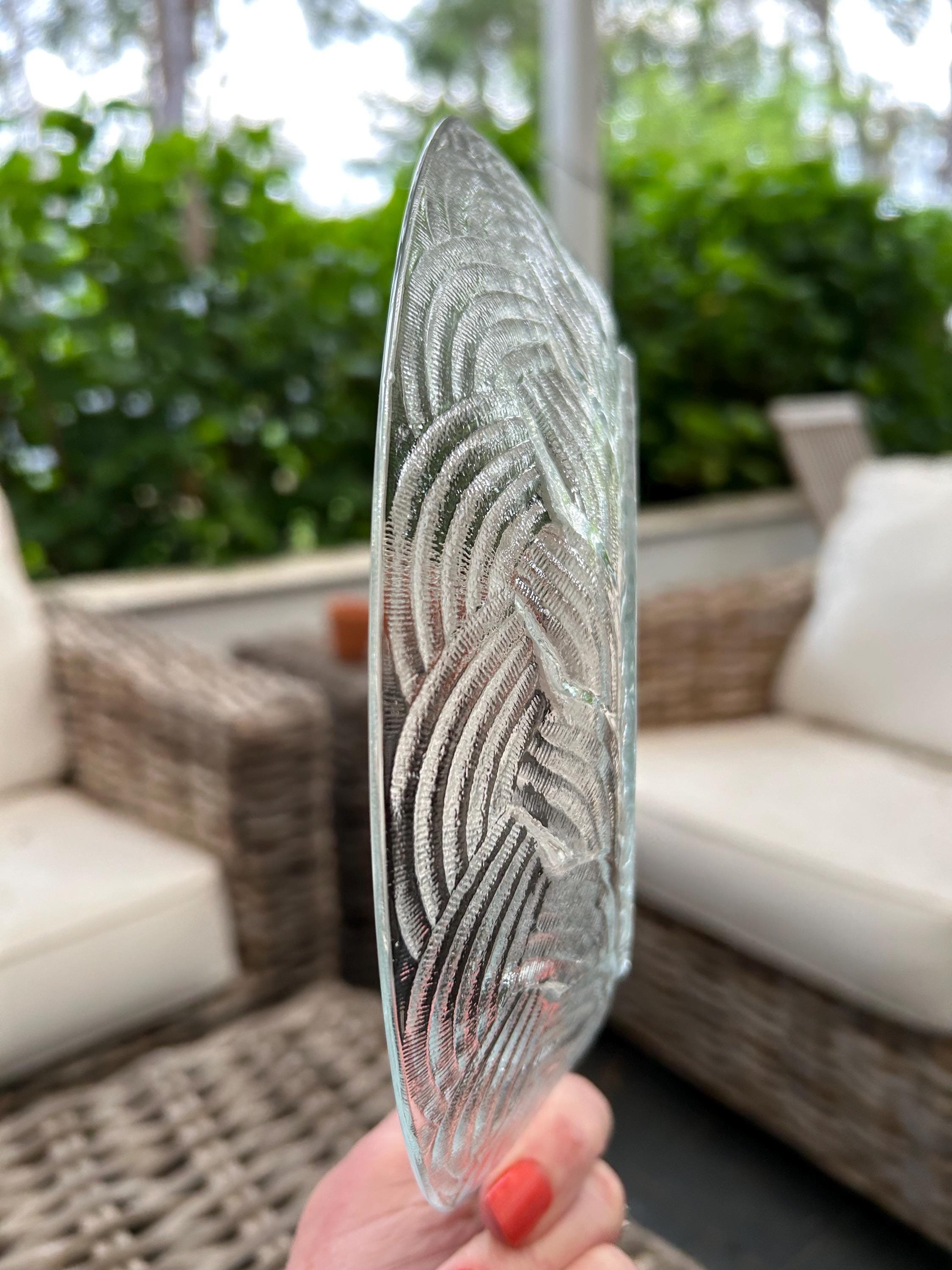 Side profile showing gentle curve and low bowl depth