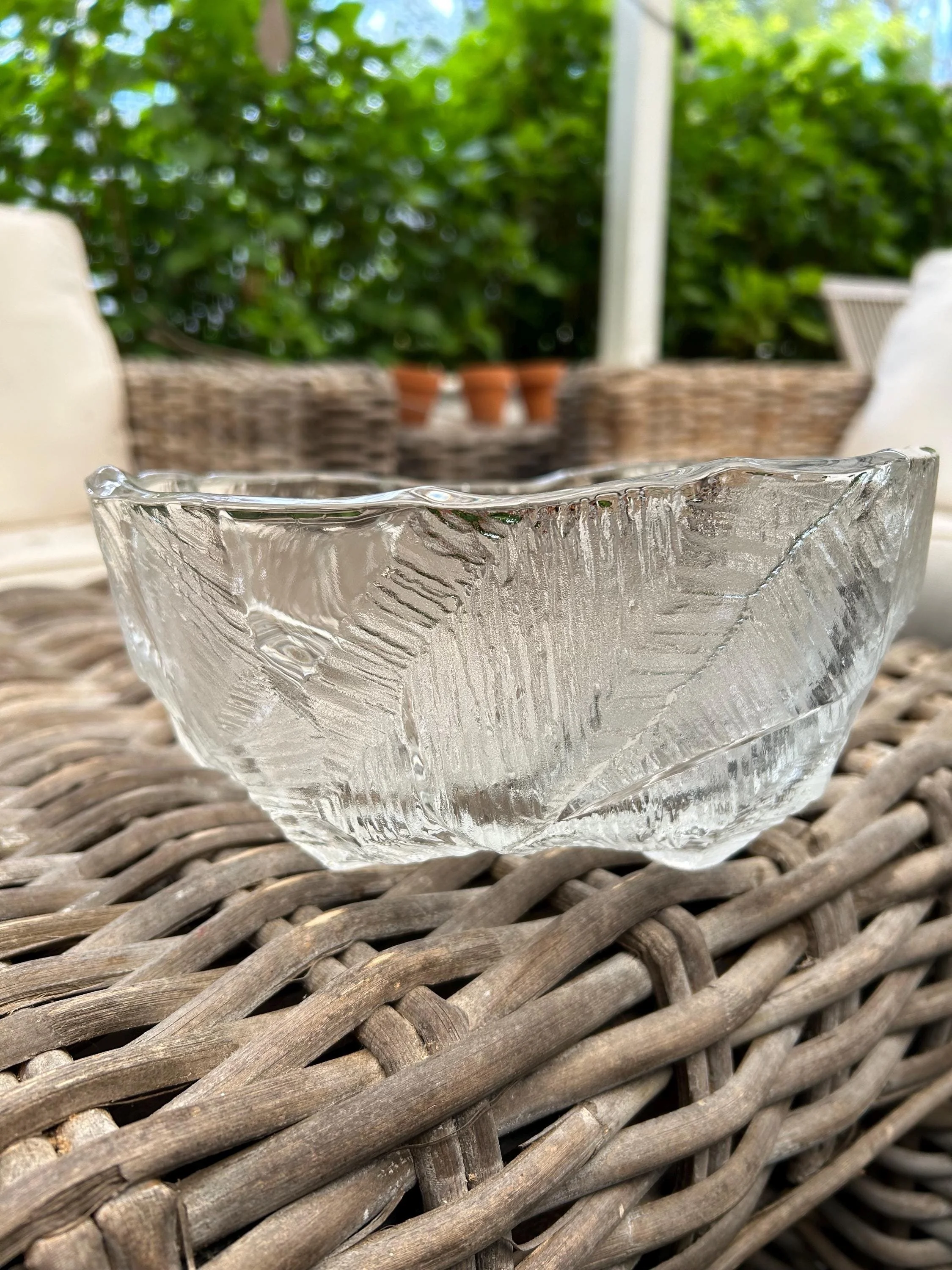 Bowl held upright showing internal textured pattern and organic shape