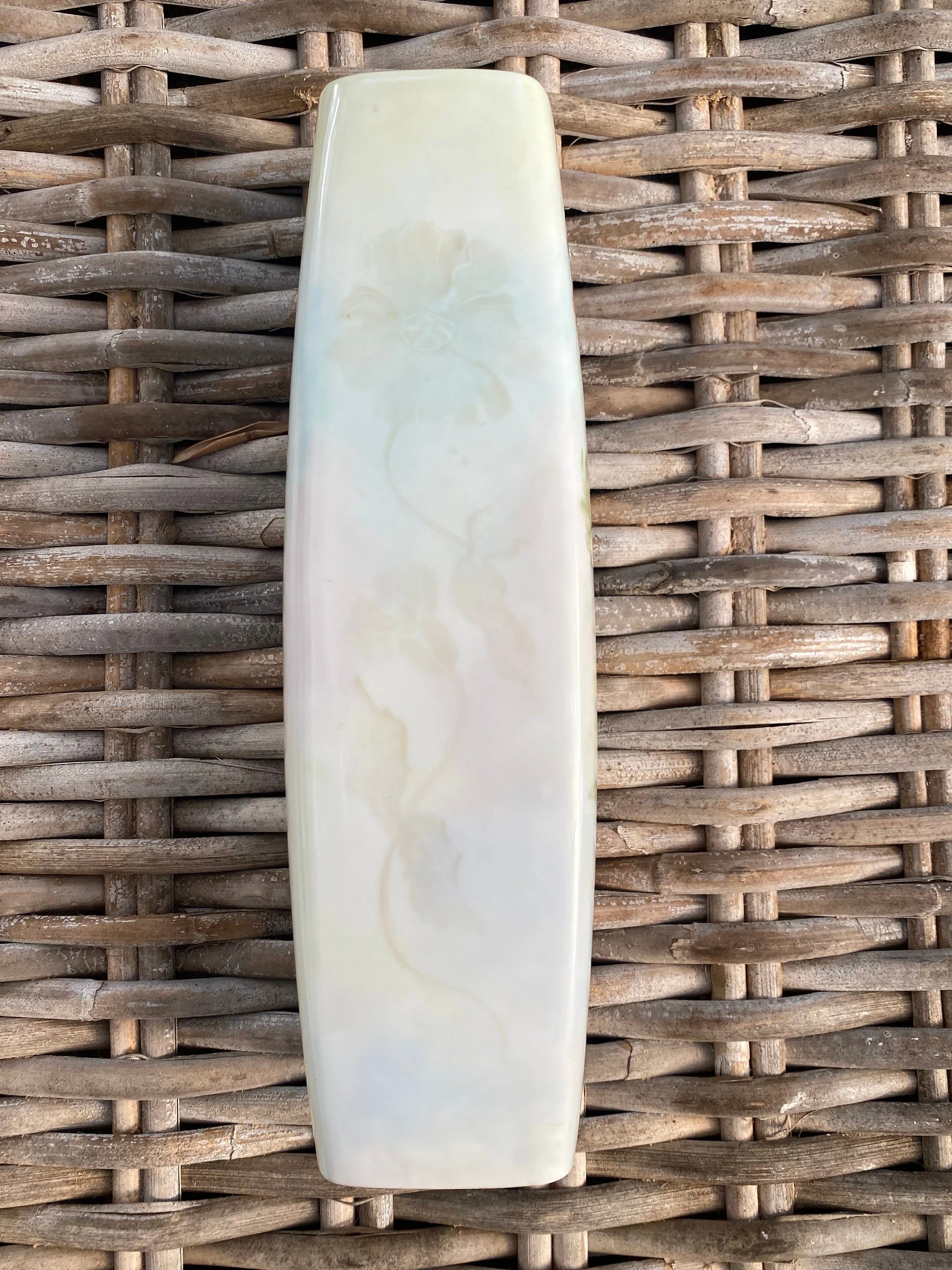 Reverse view showing natural lustre and soft tones of unpainted back