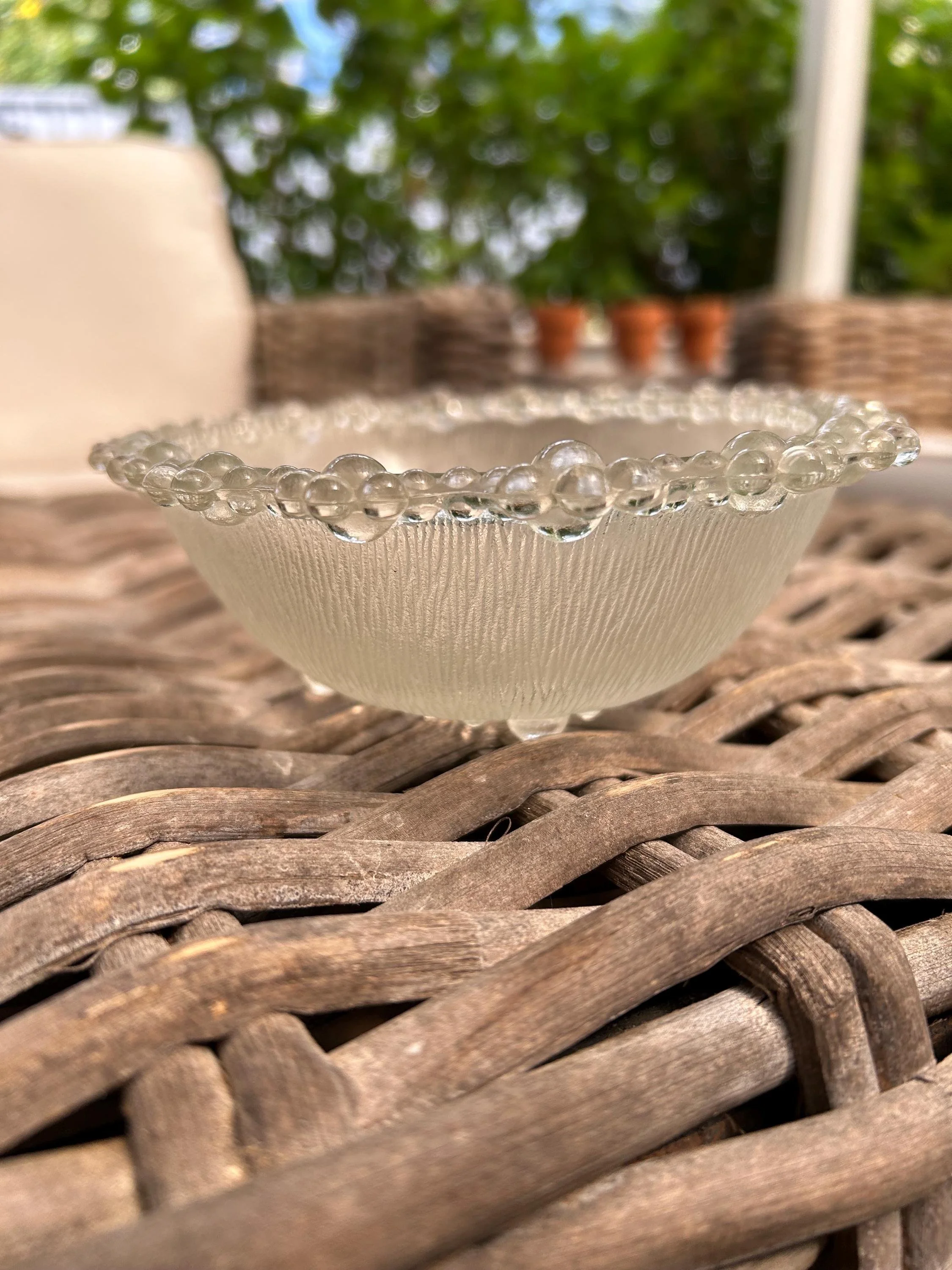 Side view showing shallow oval shape and clarity of glass