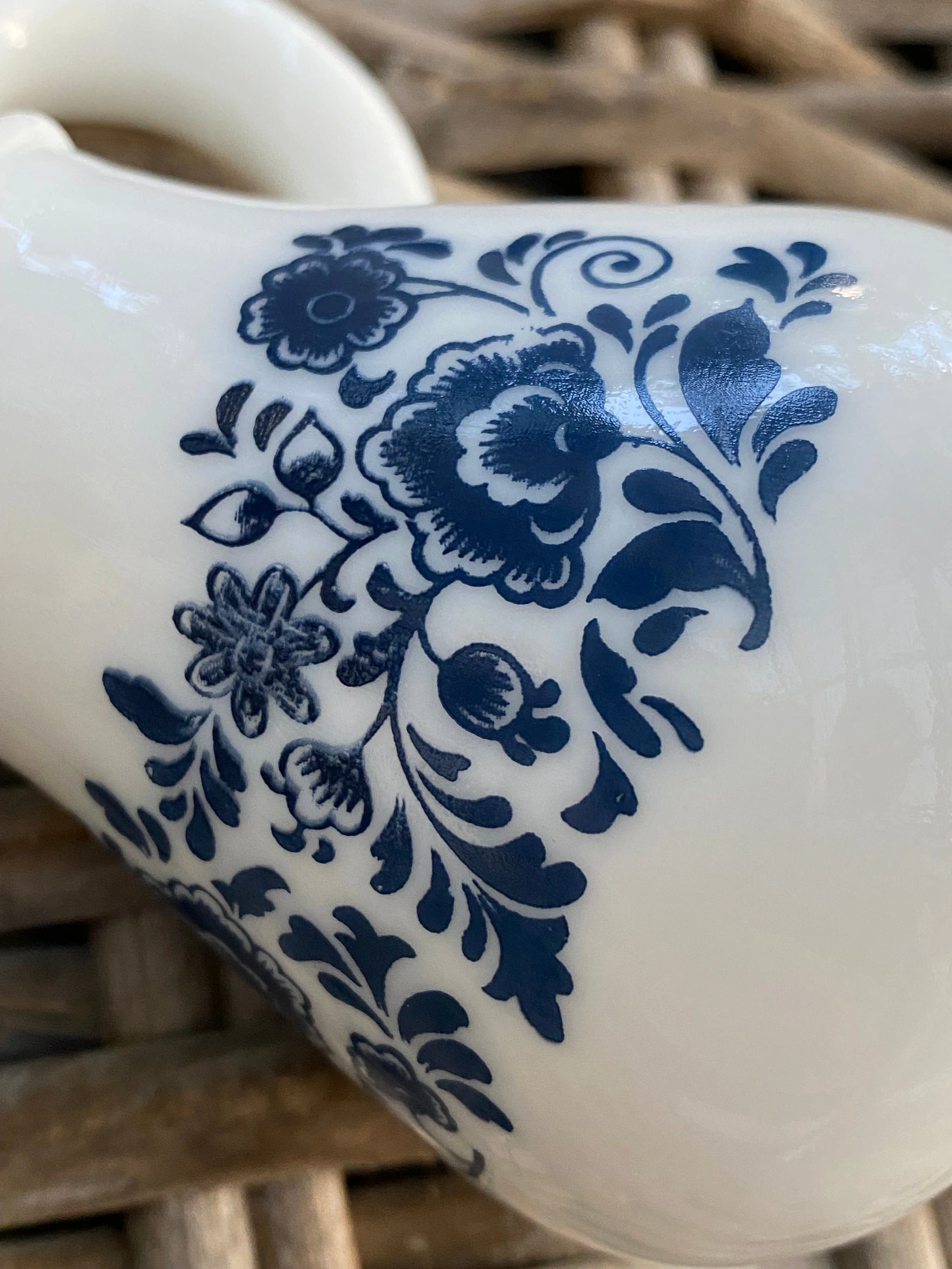 Side angle highlighting the floral transfer design