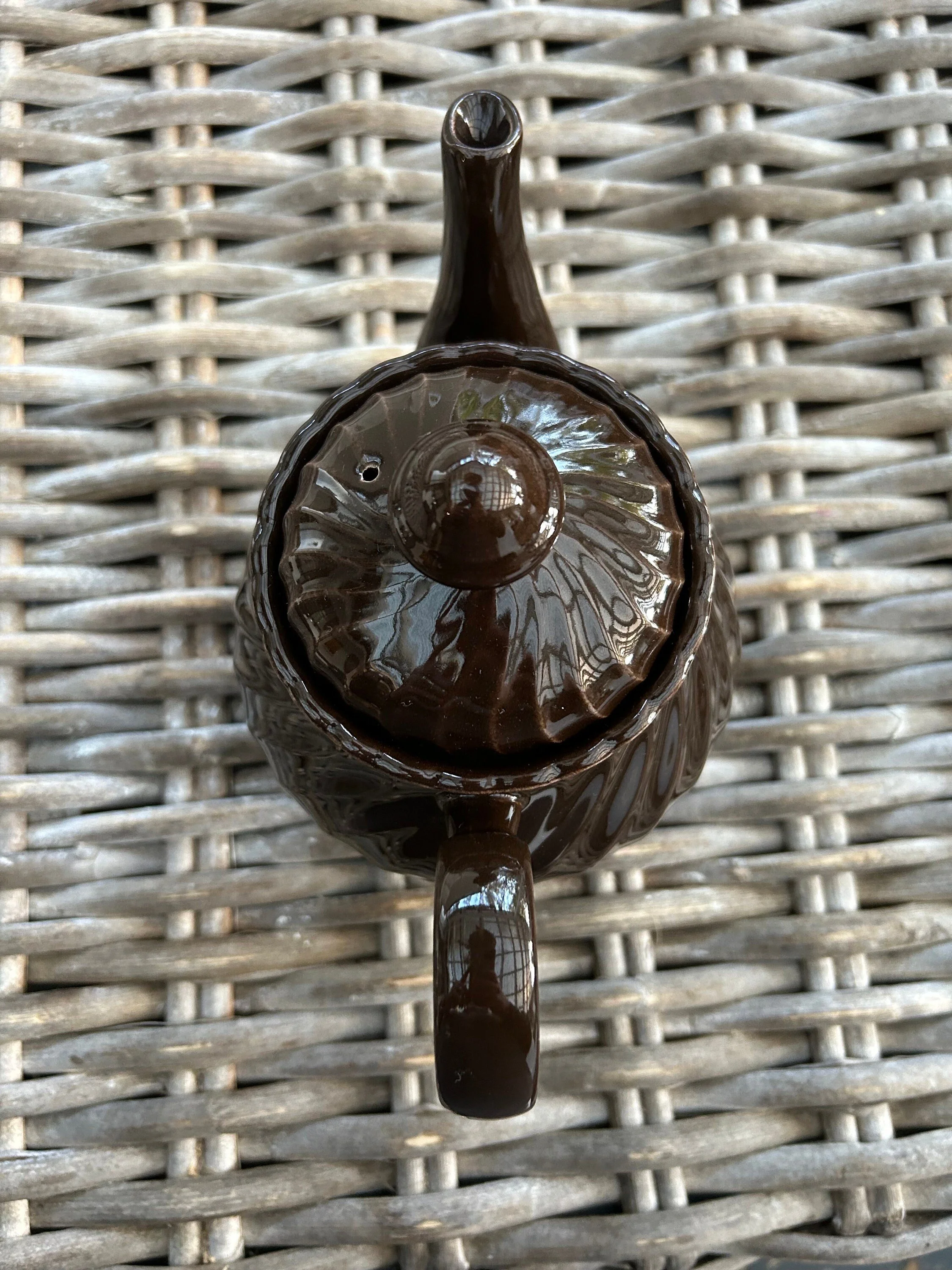 Overhead view of teapot with lid in place, showing knob finial