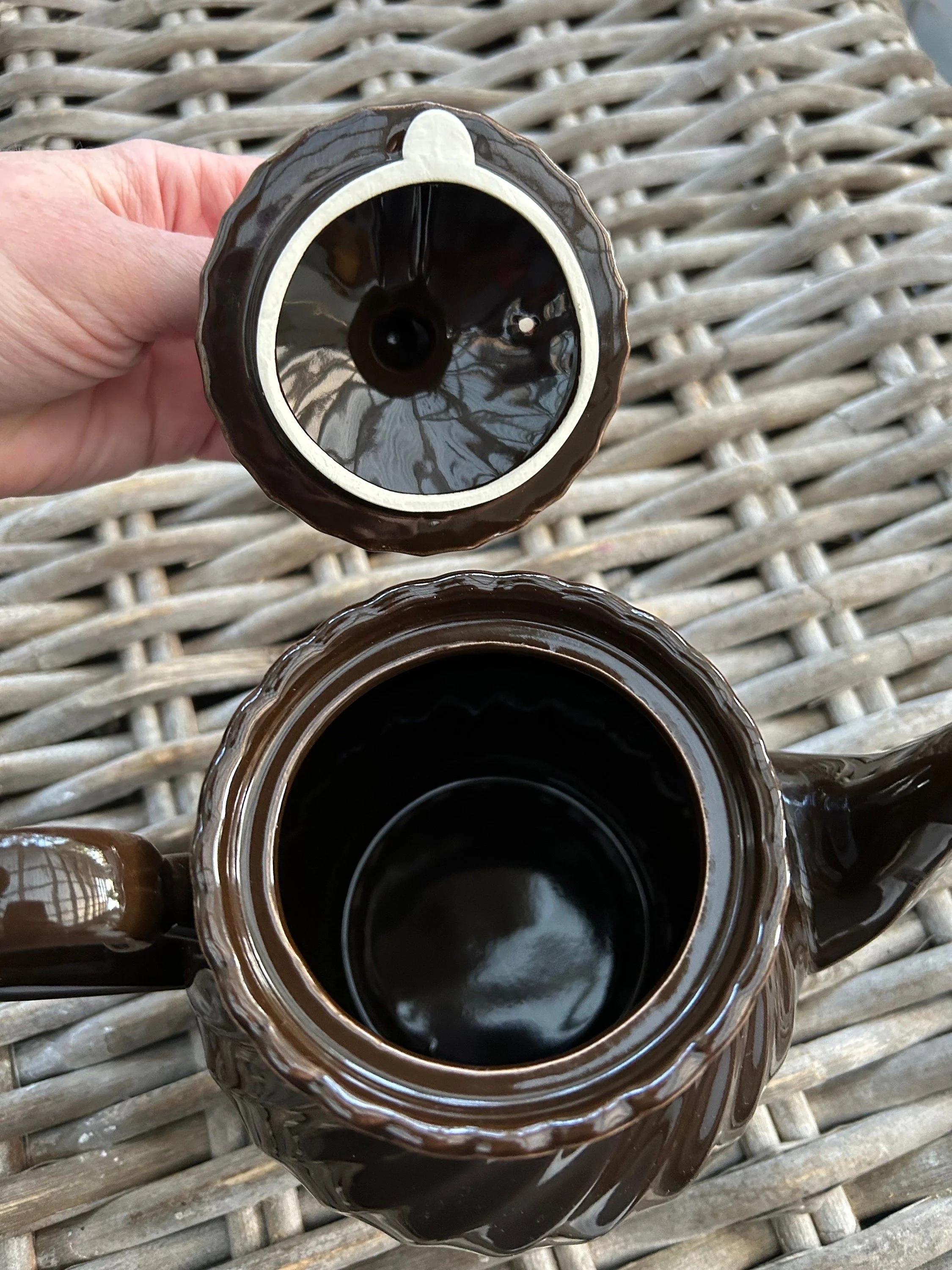 Inside view of teapot showing clean interior and spout filter