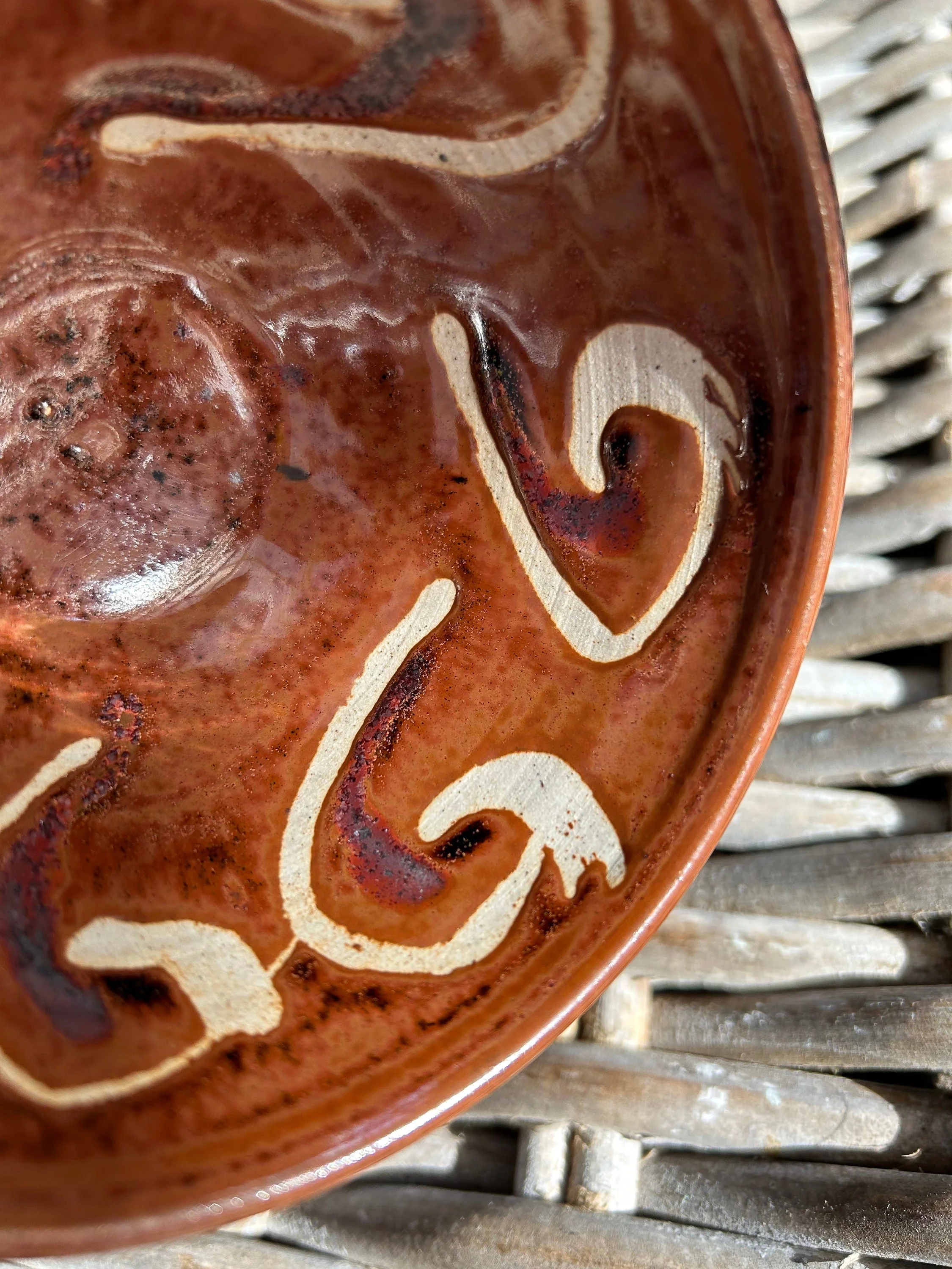 Detail of interior swirls and glossy glaze texture