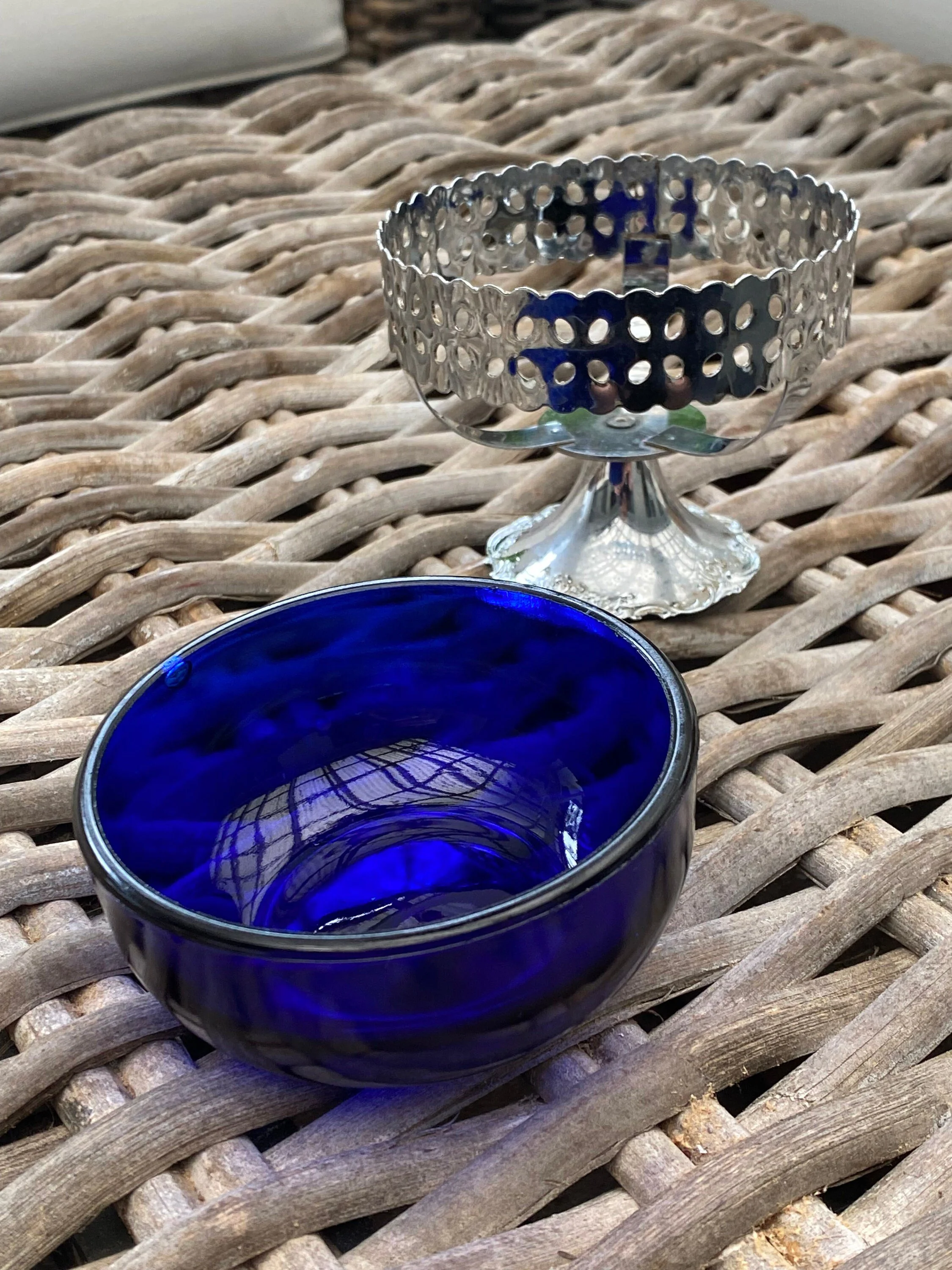 Cobalt glass bowl close-up showing reflective interior