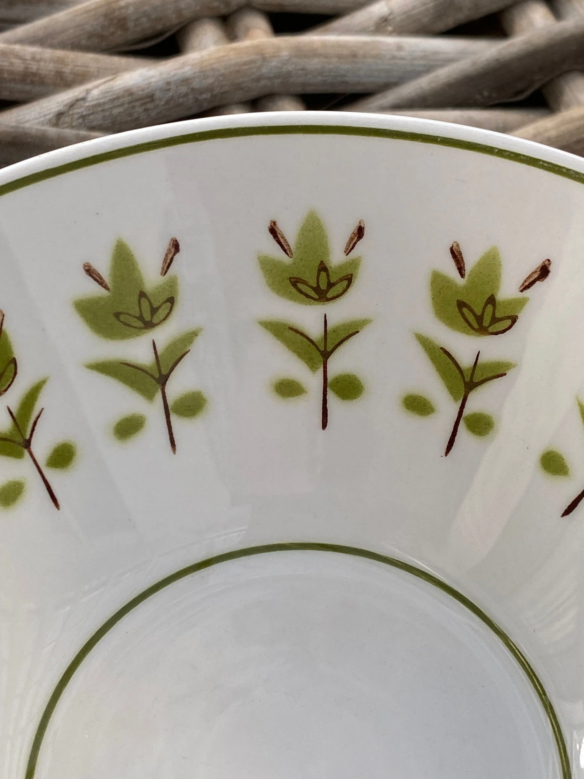 Close-up of floral motif detail in green and brown