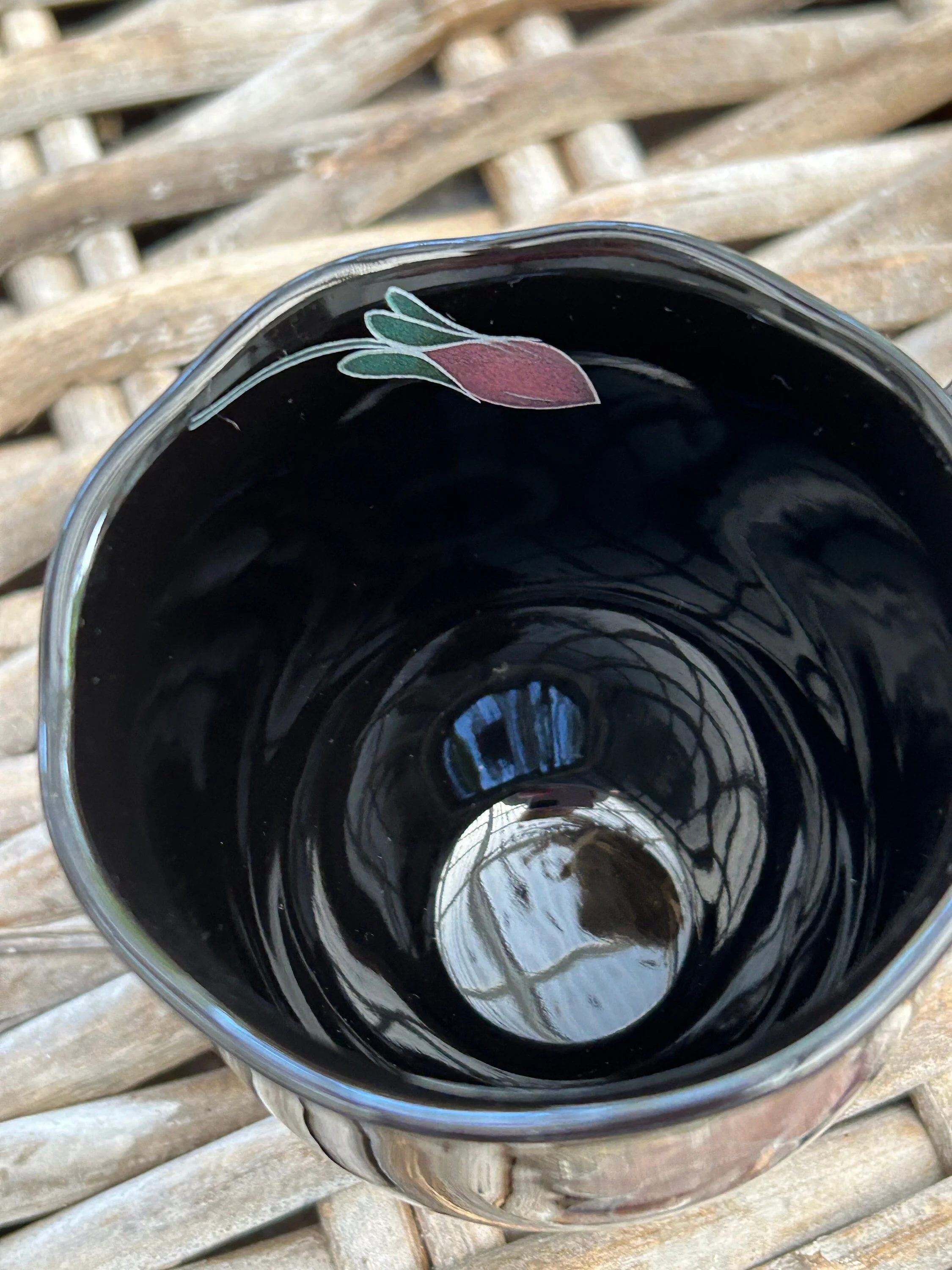 Interior view showing floral detail near rim