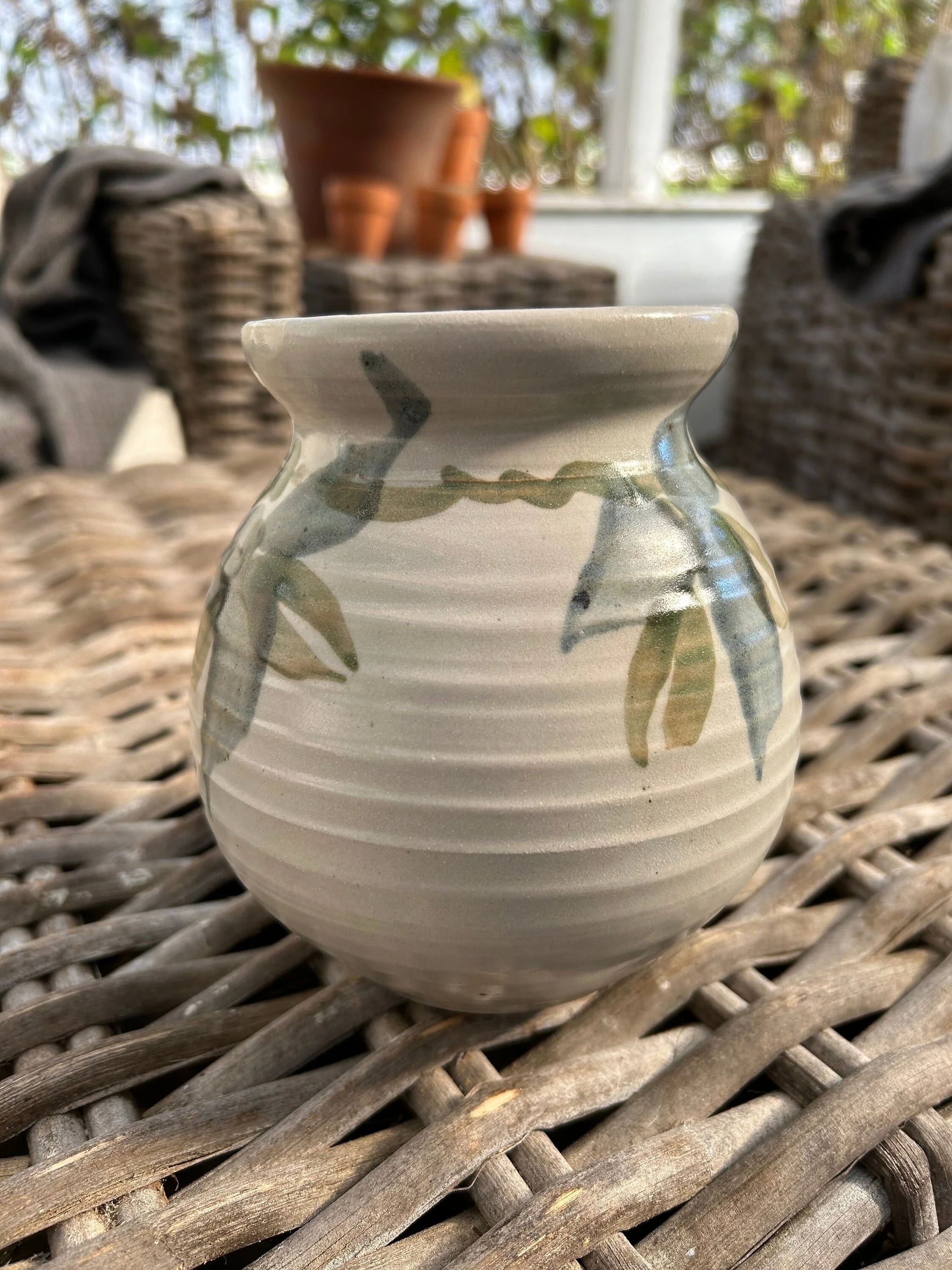 Side angle showing ribbed texture and hand-painted detailing